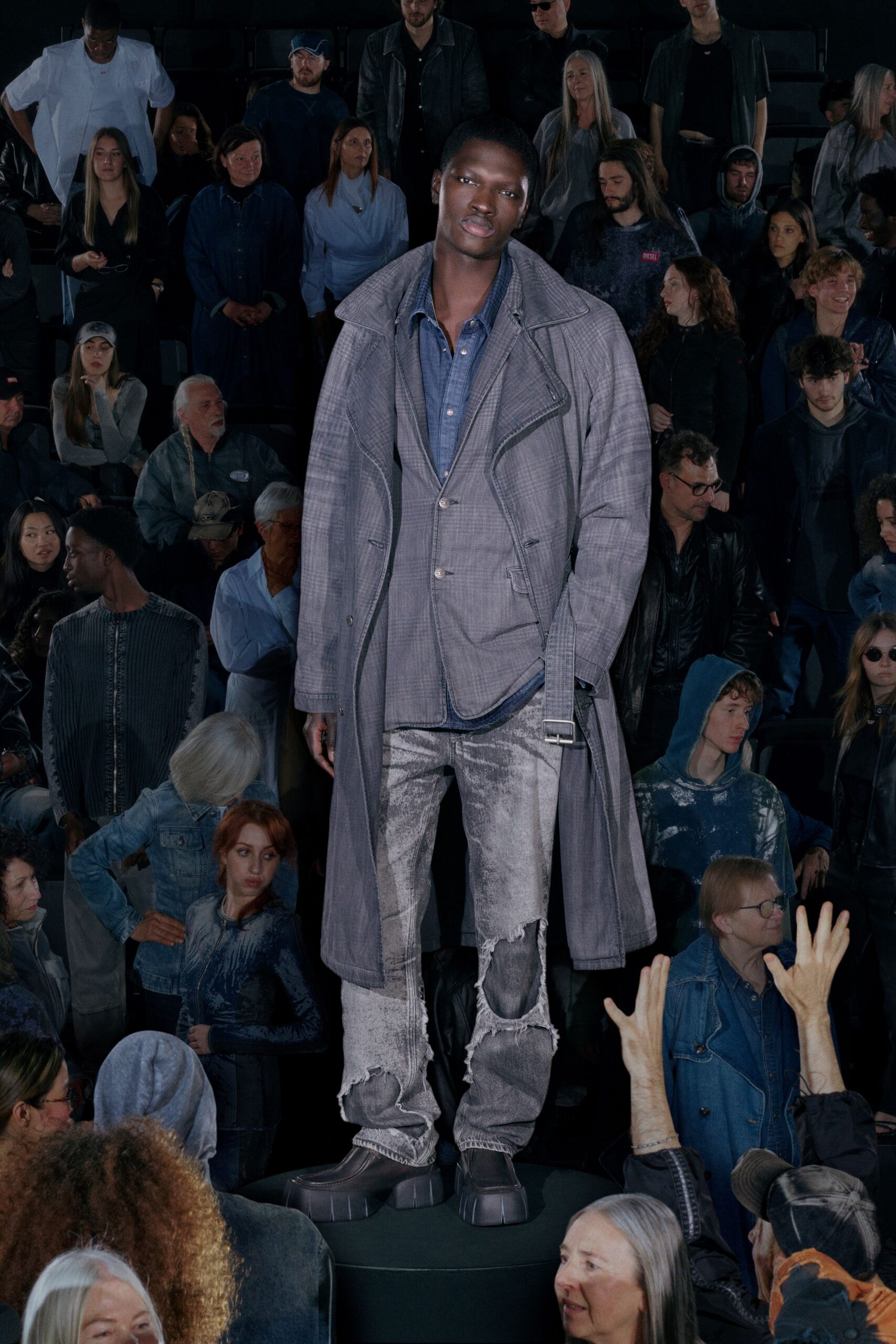 gray coat with blue shirt