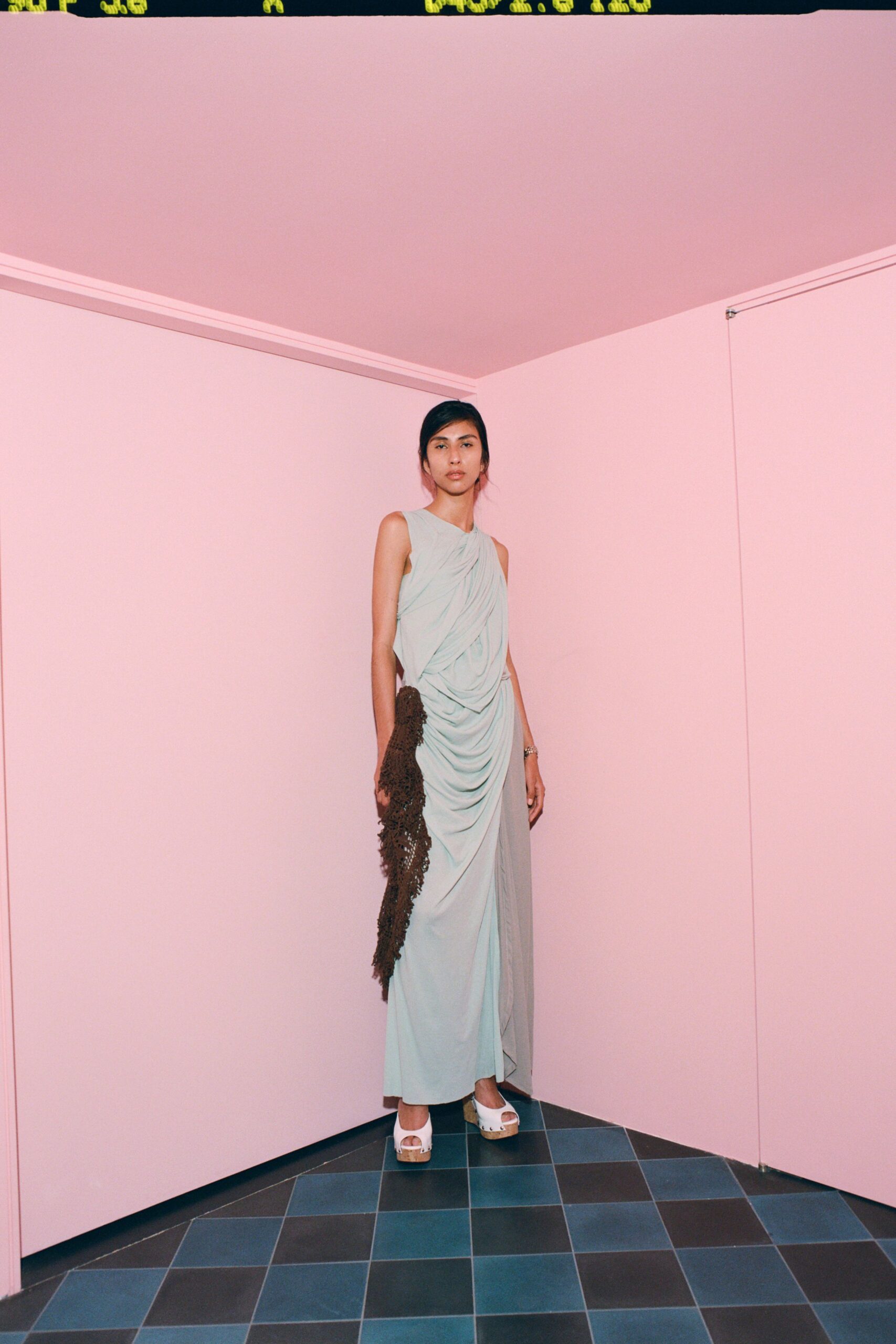 light blue draped gown with platform shoes