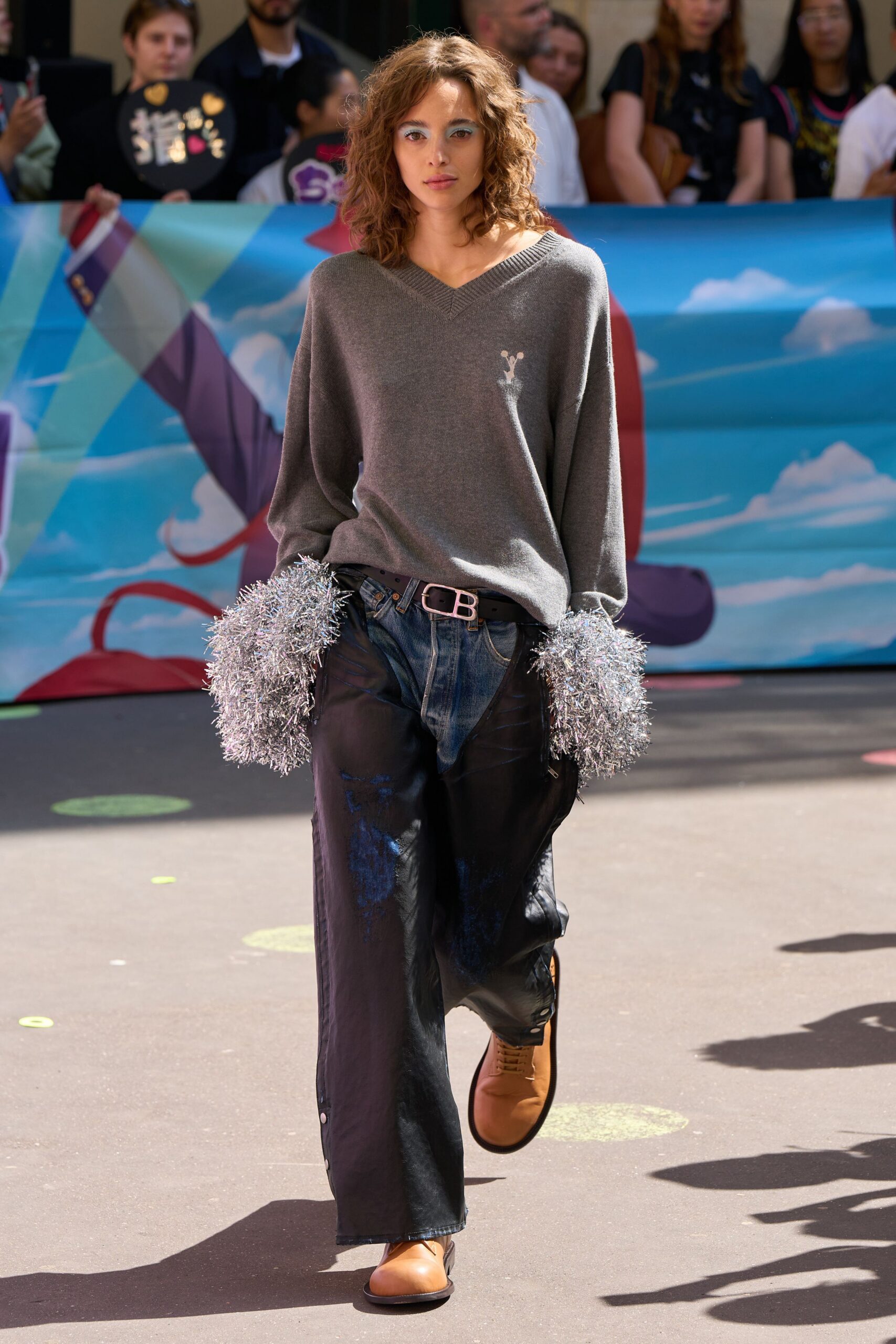 gray relaxed sweater with distressed pants