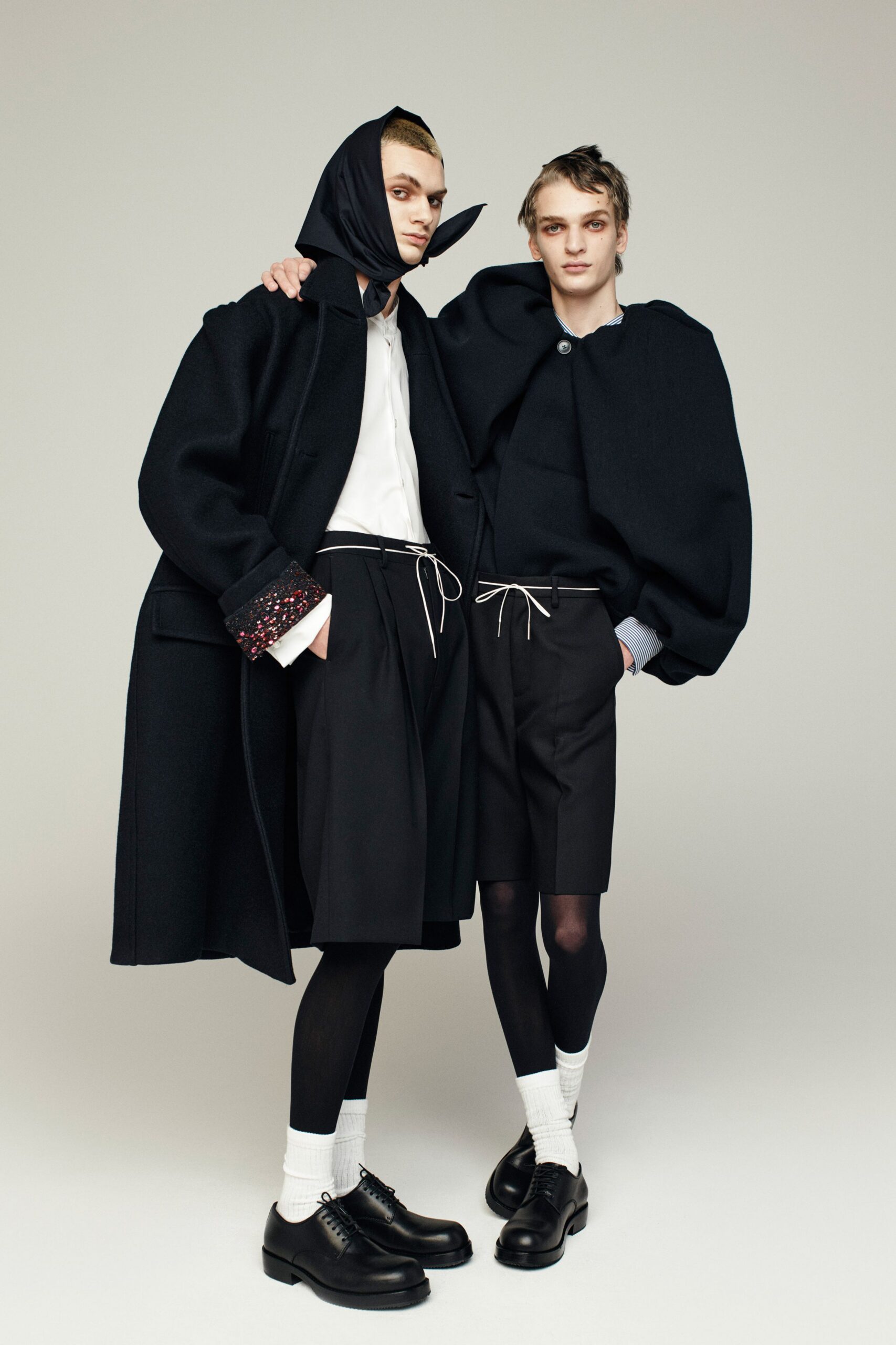 black oversized coat and shorts