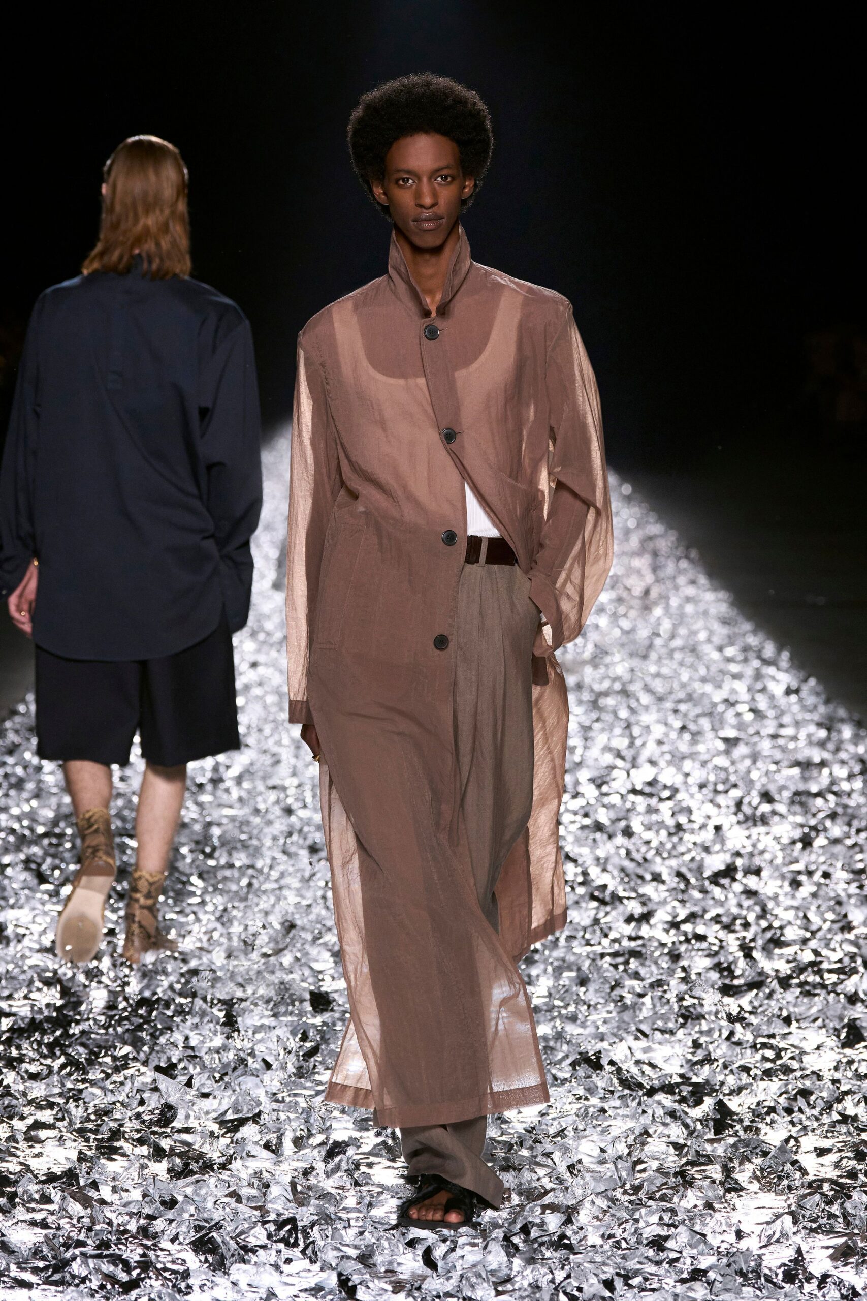 brown cotton coat with beige pants