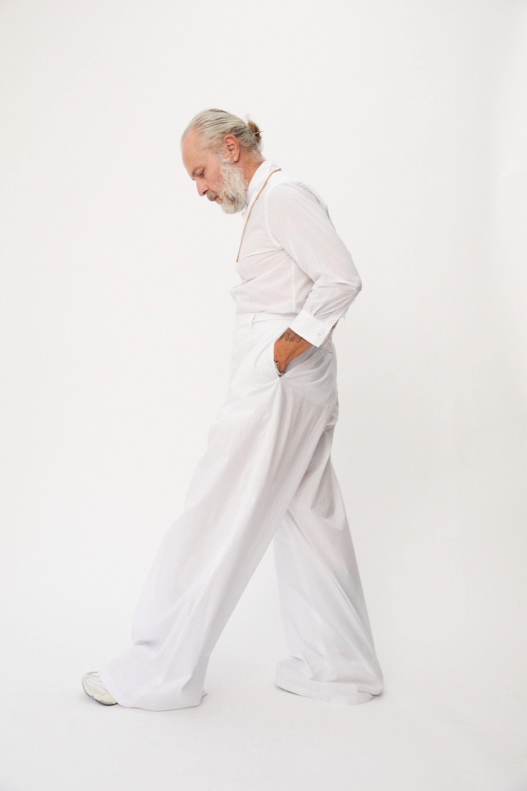 white relaxed shirt and pants