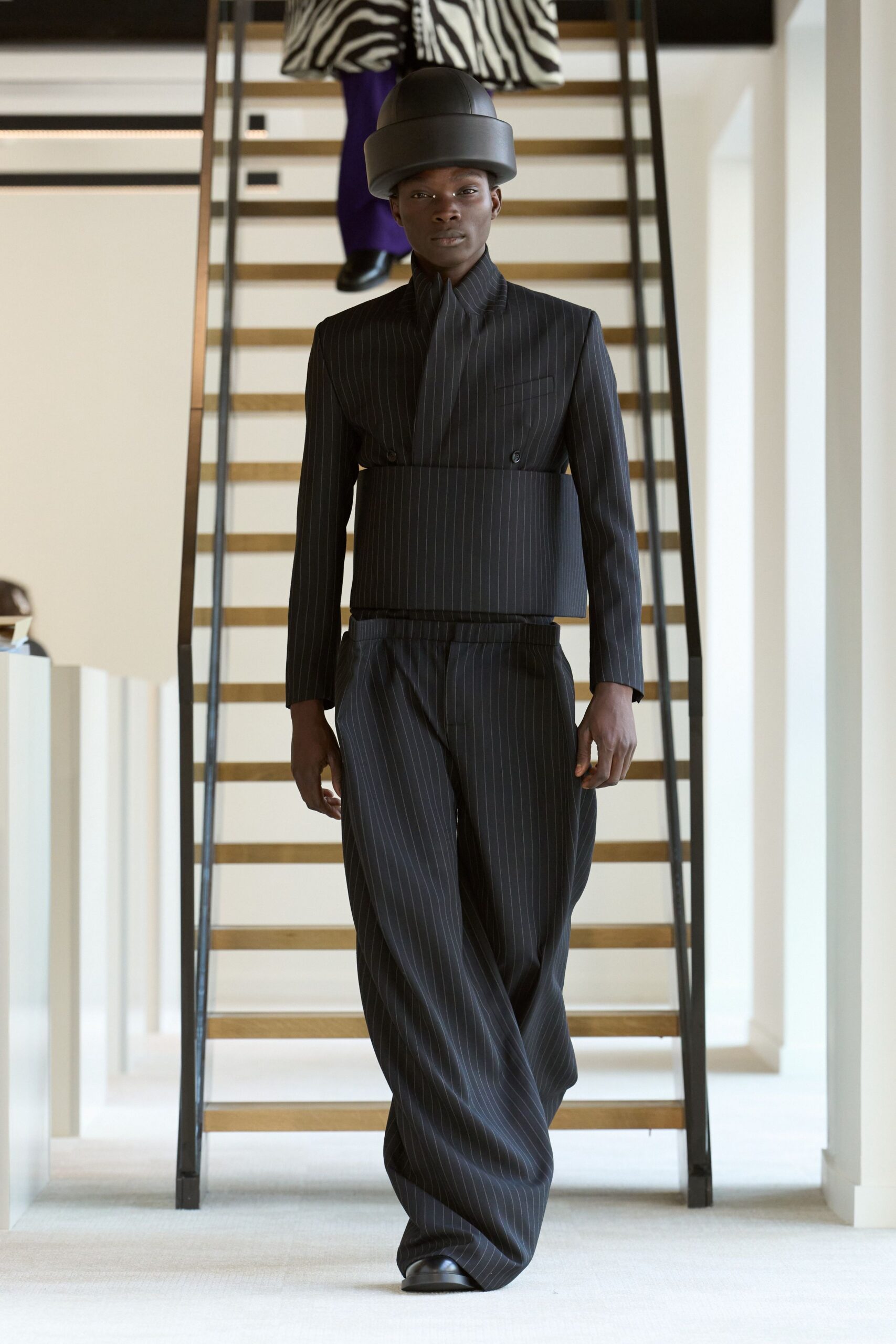 black tailored suit with hat