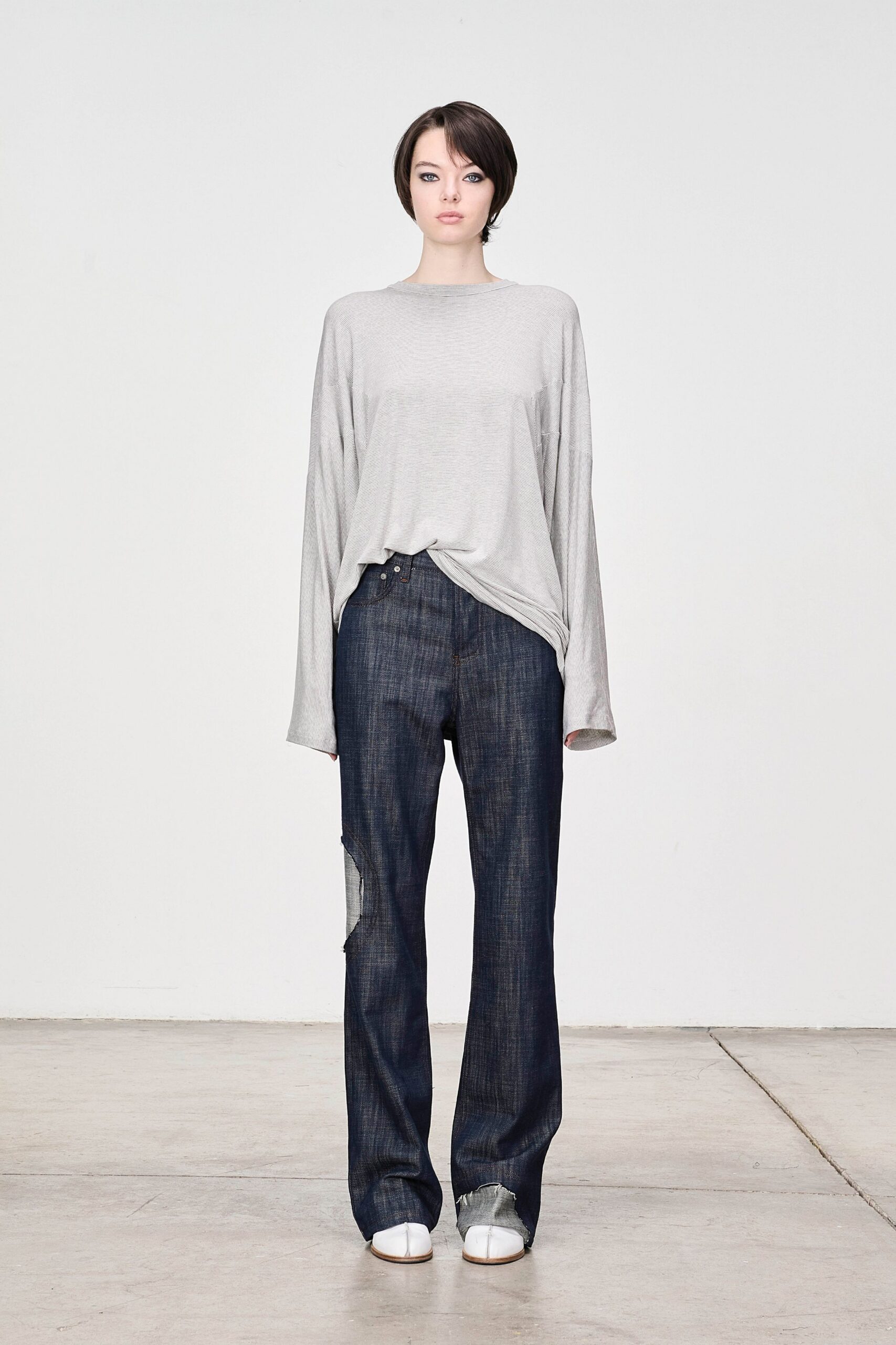 gray relaxed top with blue jeans