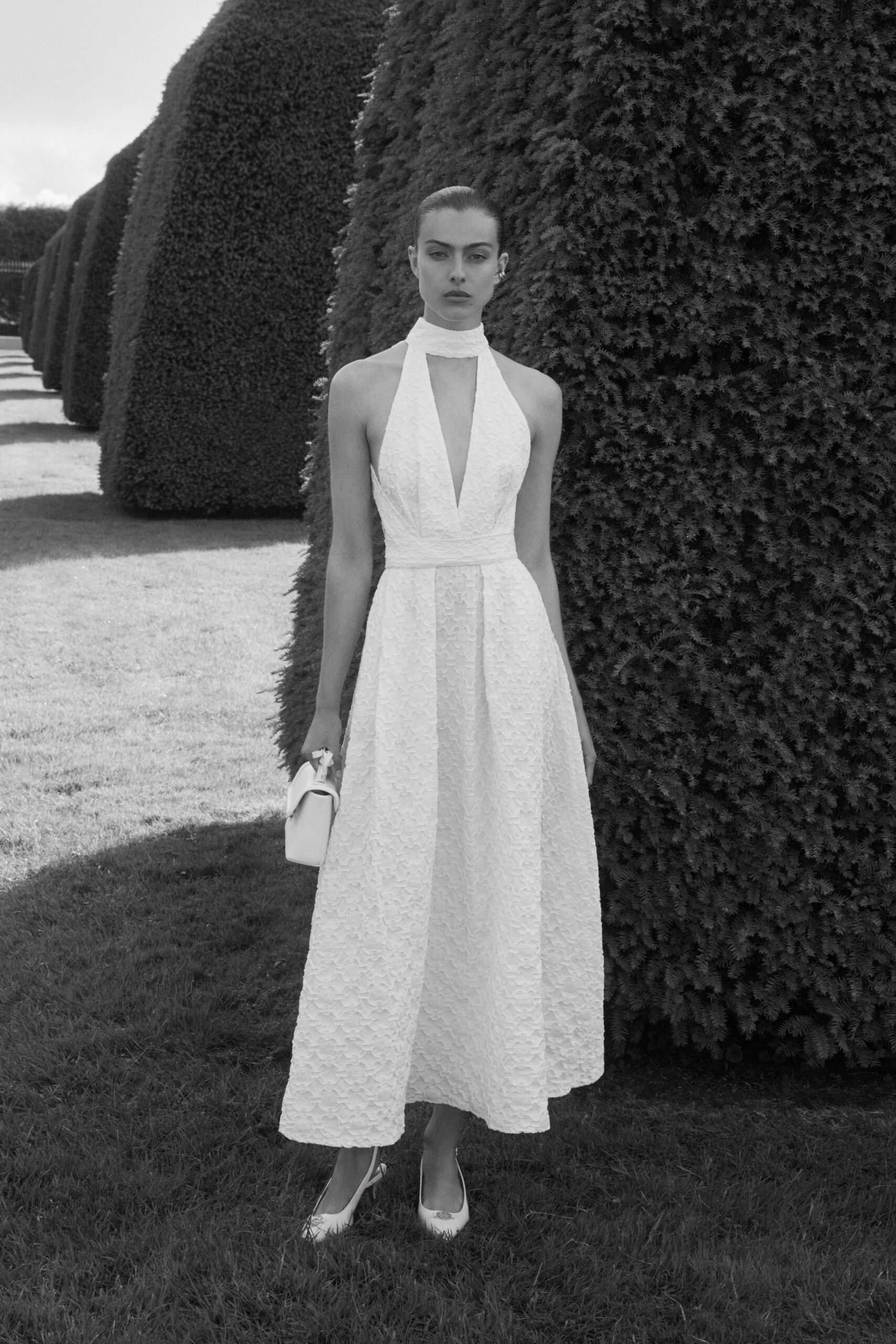 white pleated midi dress