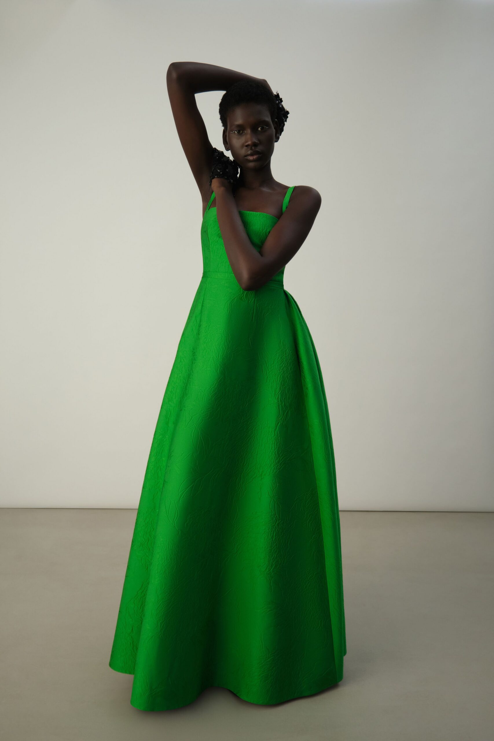 green silk sleeveless gown