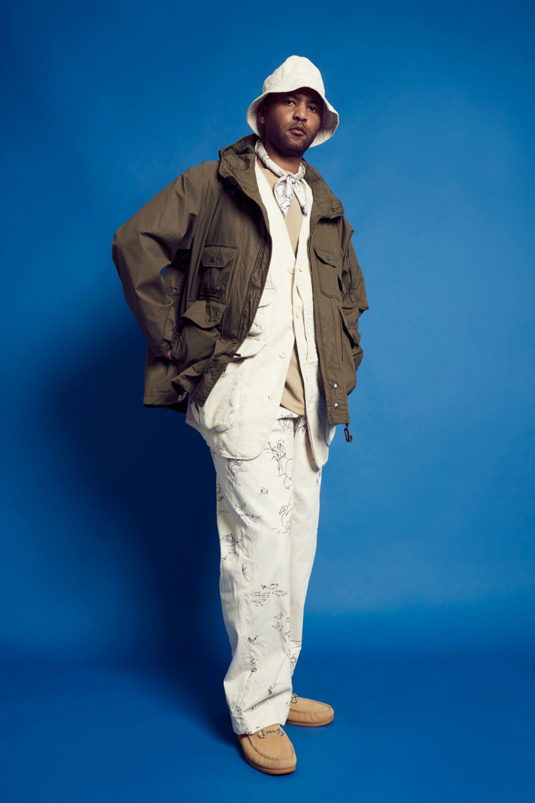 green relaxed jacket with beige shirt