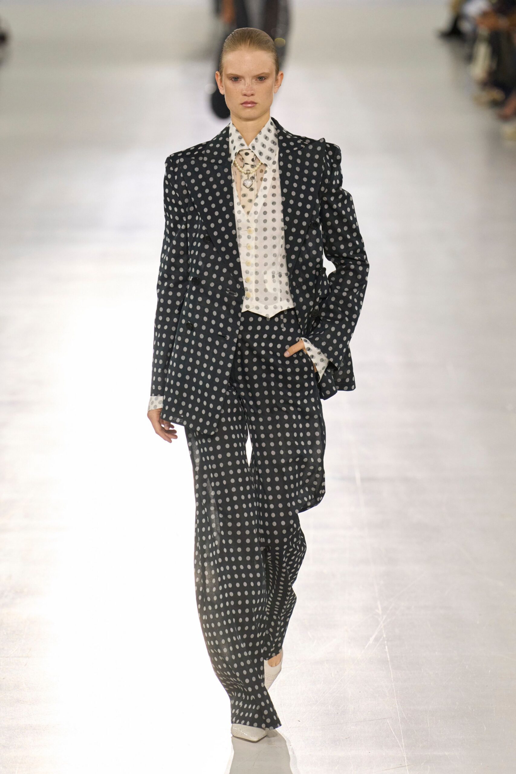 black and white polka-dot suit