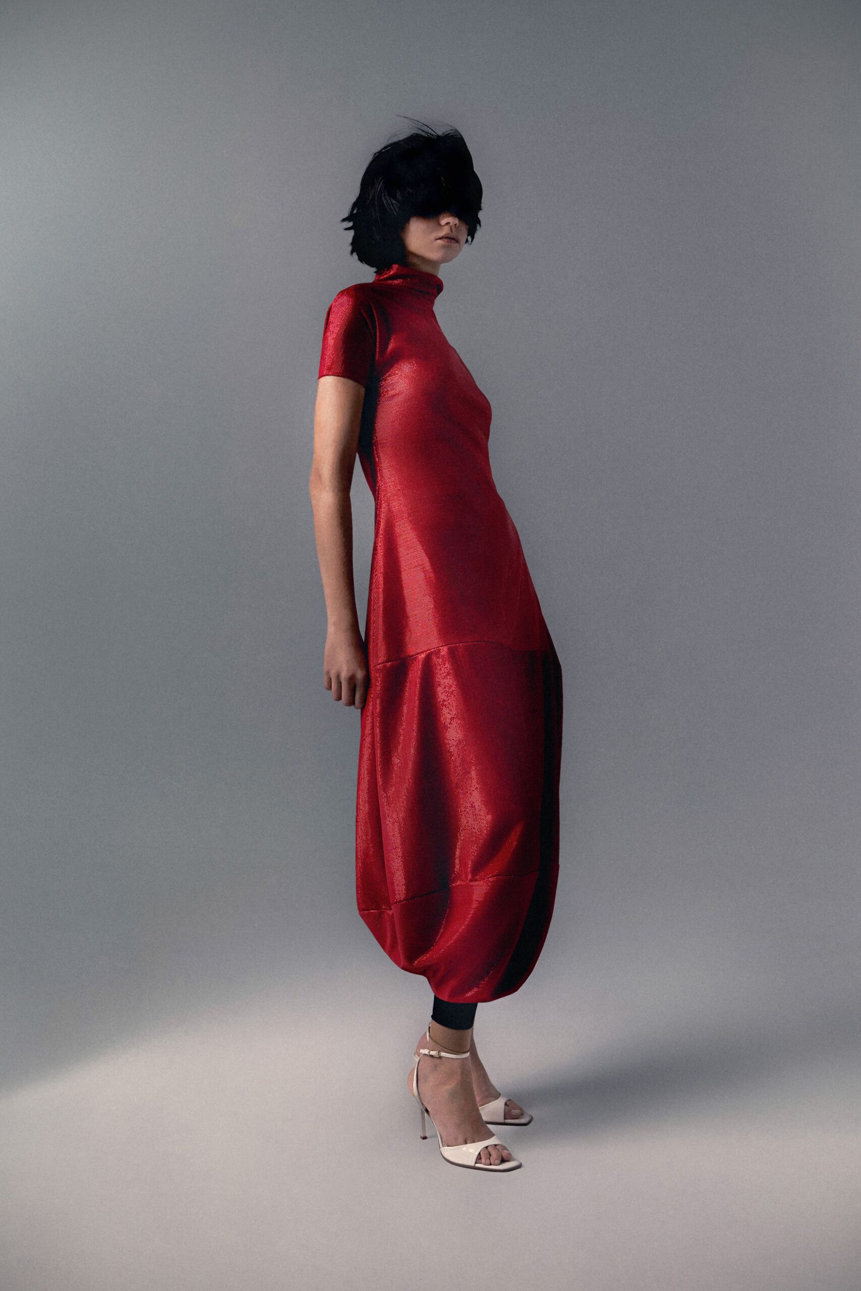 red silk short-sleeve high-neck relaxed draped shiny dress