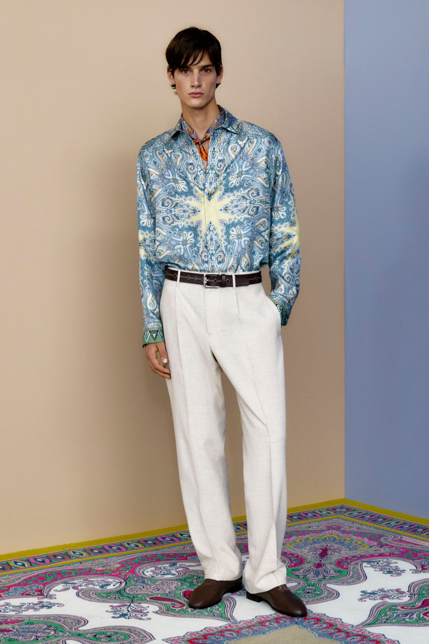 blue printed shirt and white pants