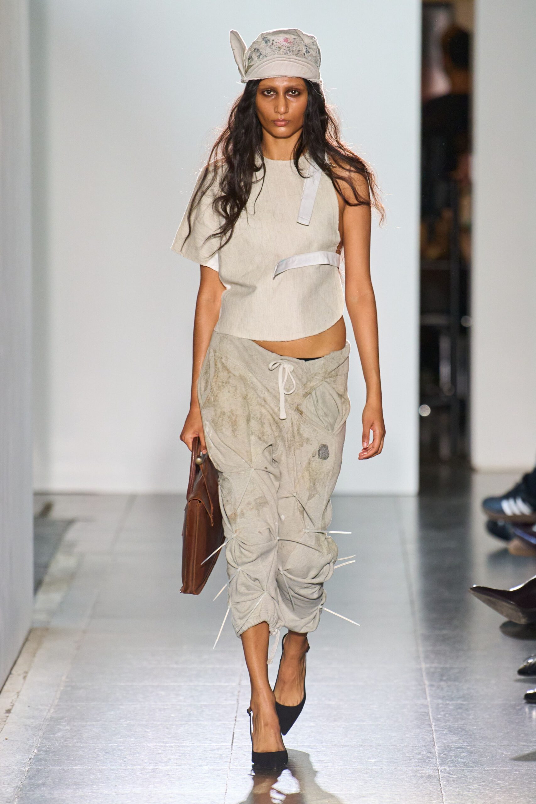 beige asymmetric top gray cargo pants