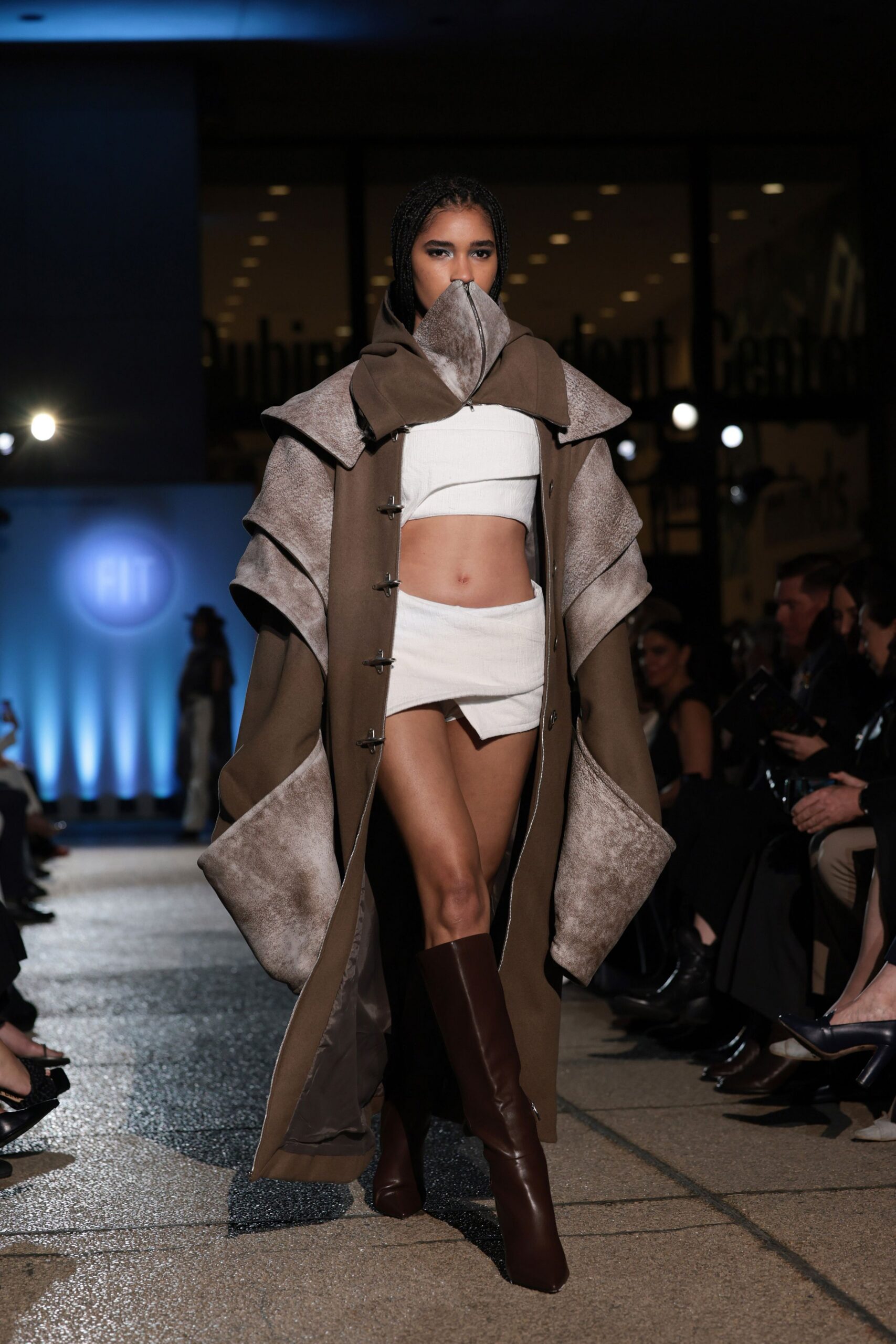brown faux-fur coat with white top and shorts