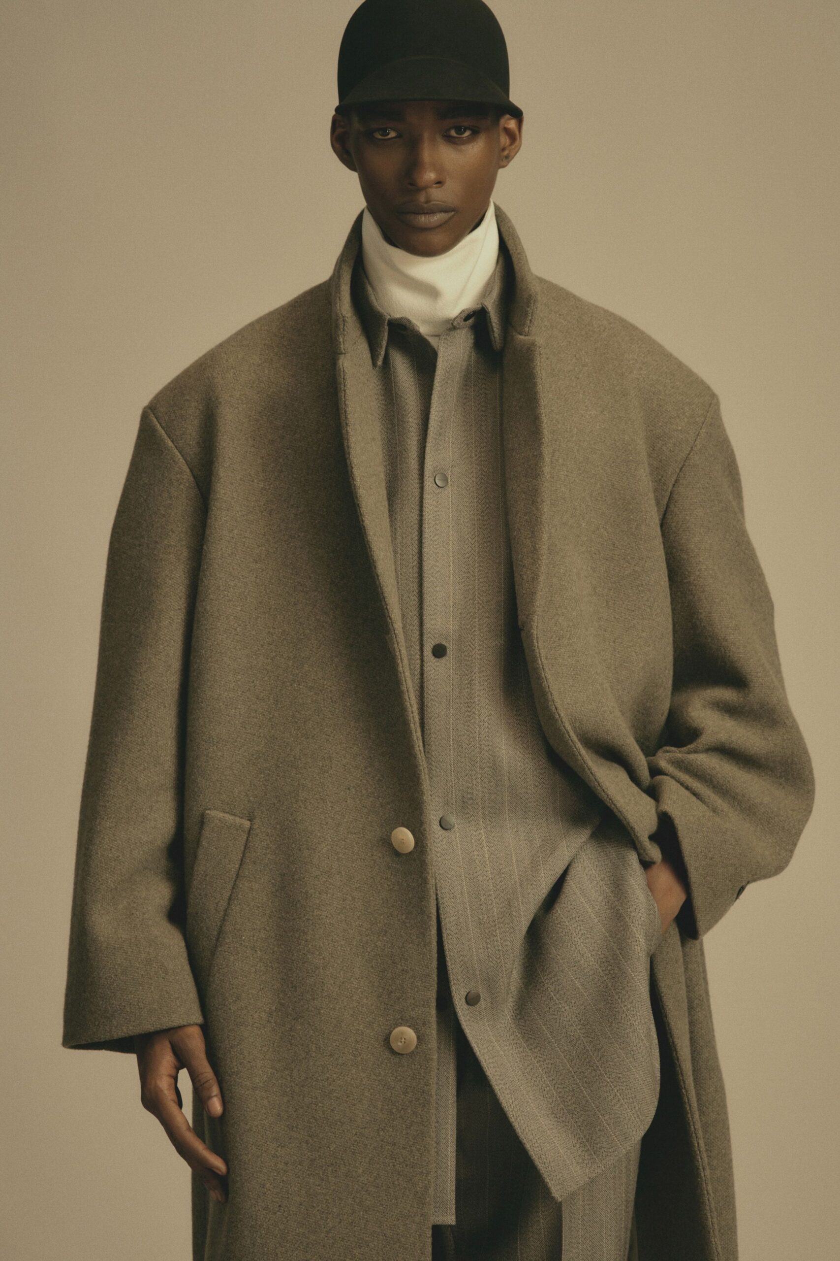 gray wool long-sleeve collared oversized buttoned coat