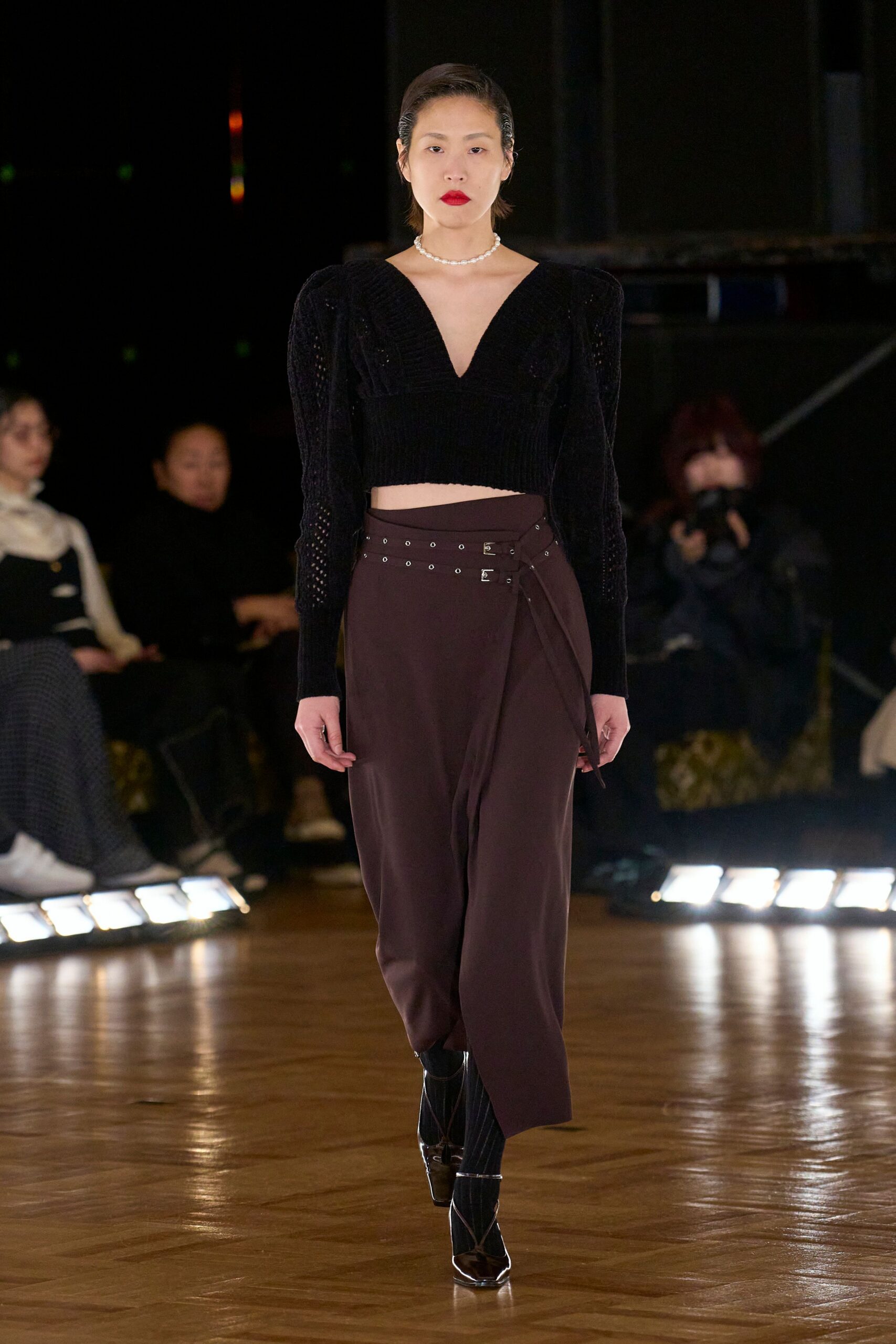 black crop-top brown skirt