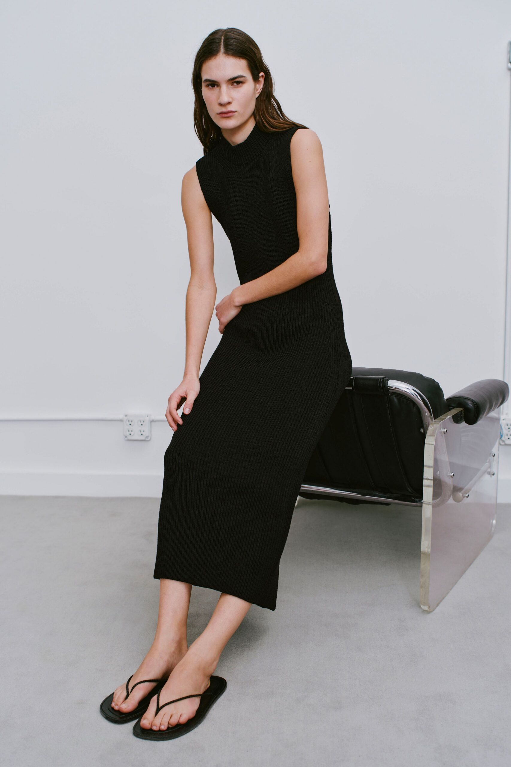 black fitted sleeveless midi dress with sandals