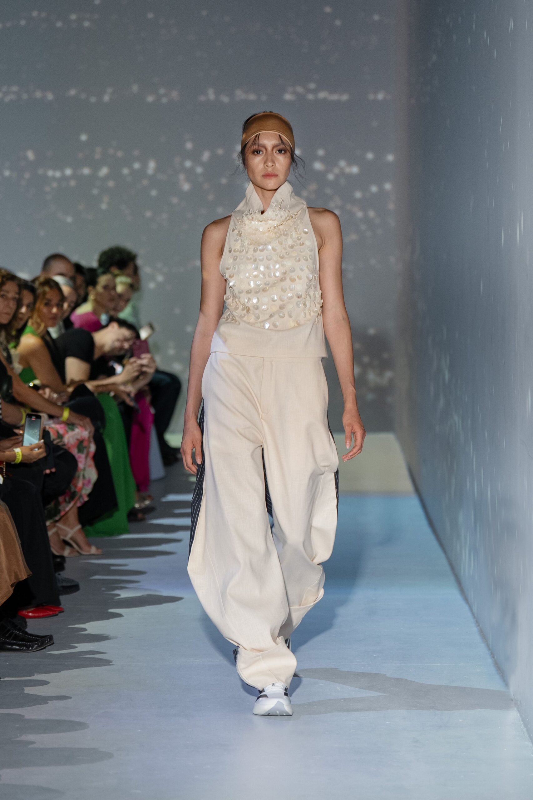 beige silk sleeveless high-neck fitted pleated embellished top