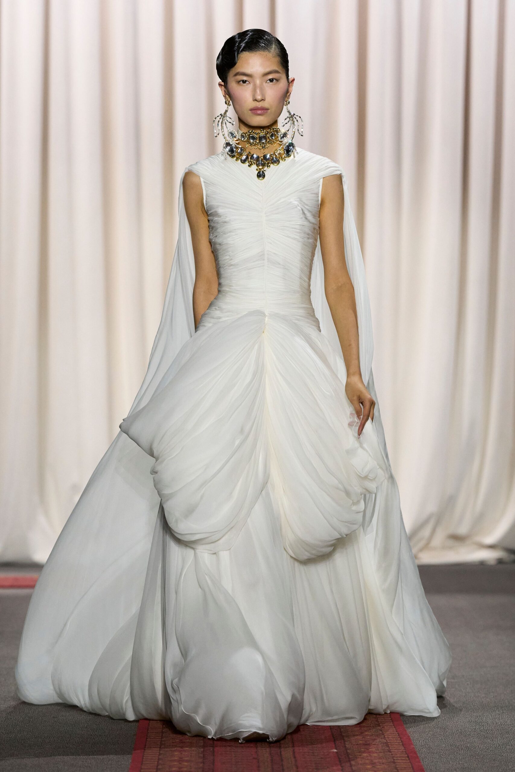 white silk sleeveless gown
