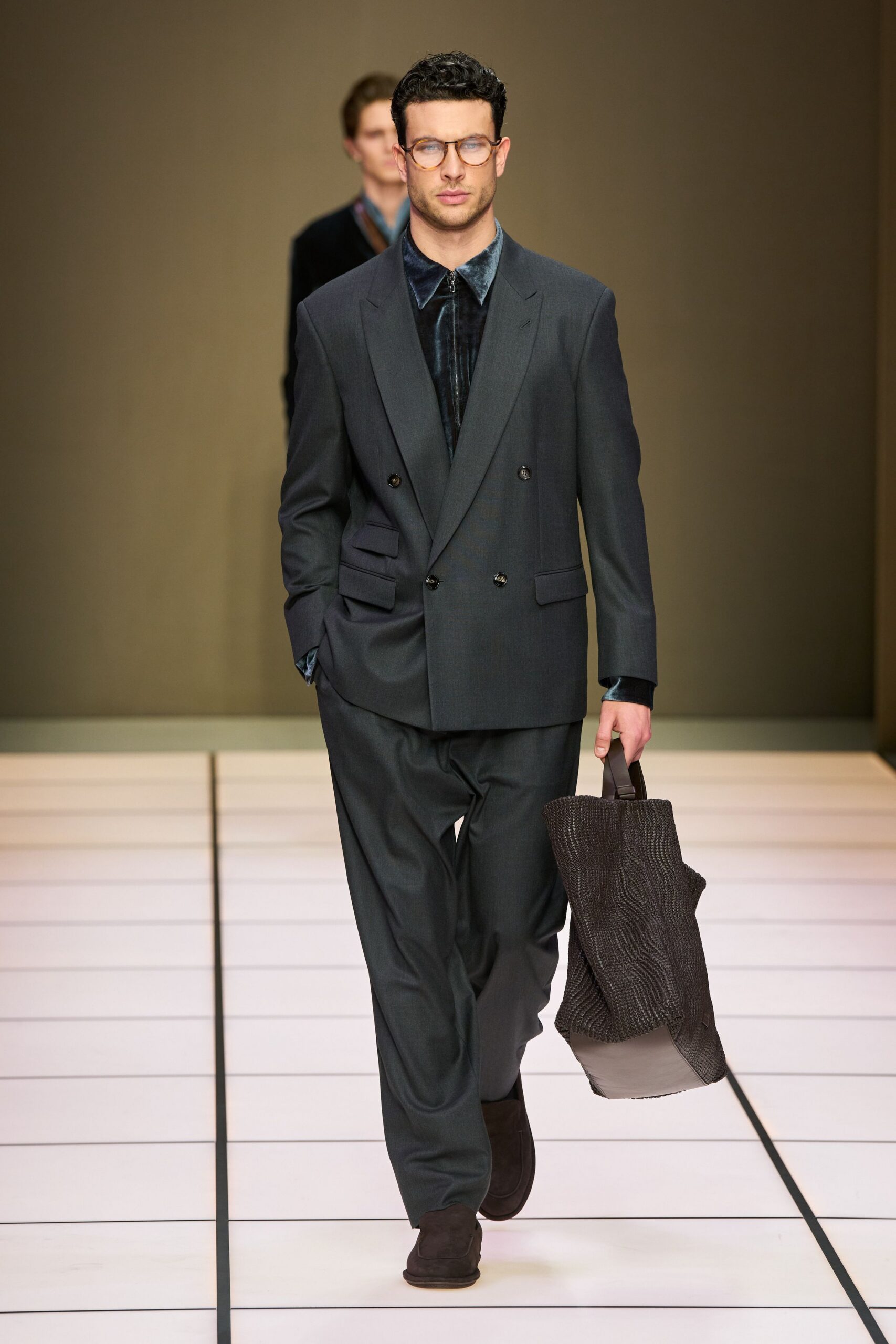 gray tailored suit with blue shirt