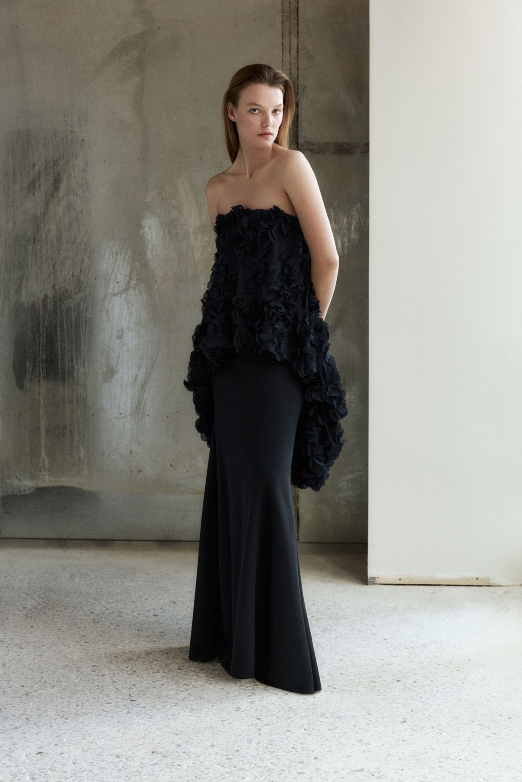 black strapless ruffled gown