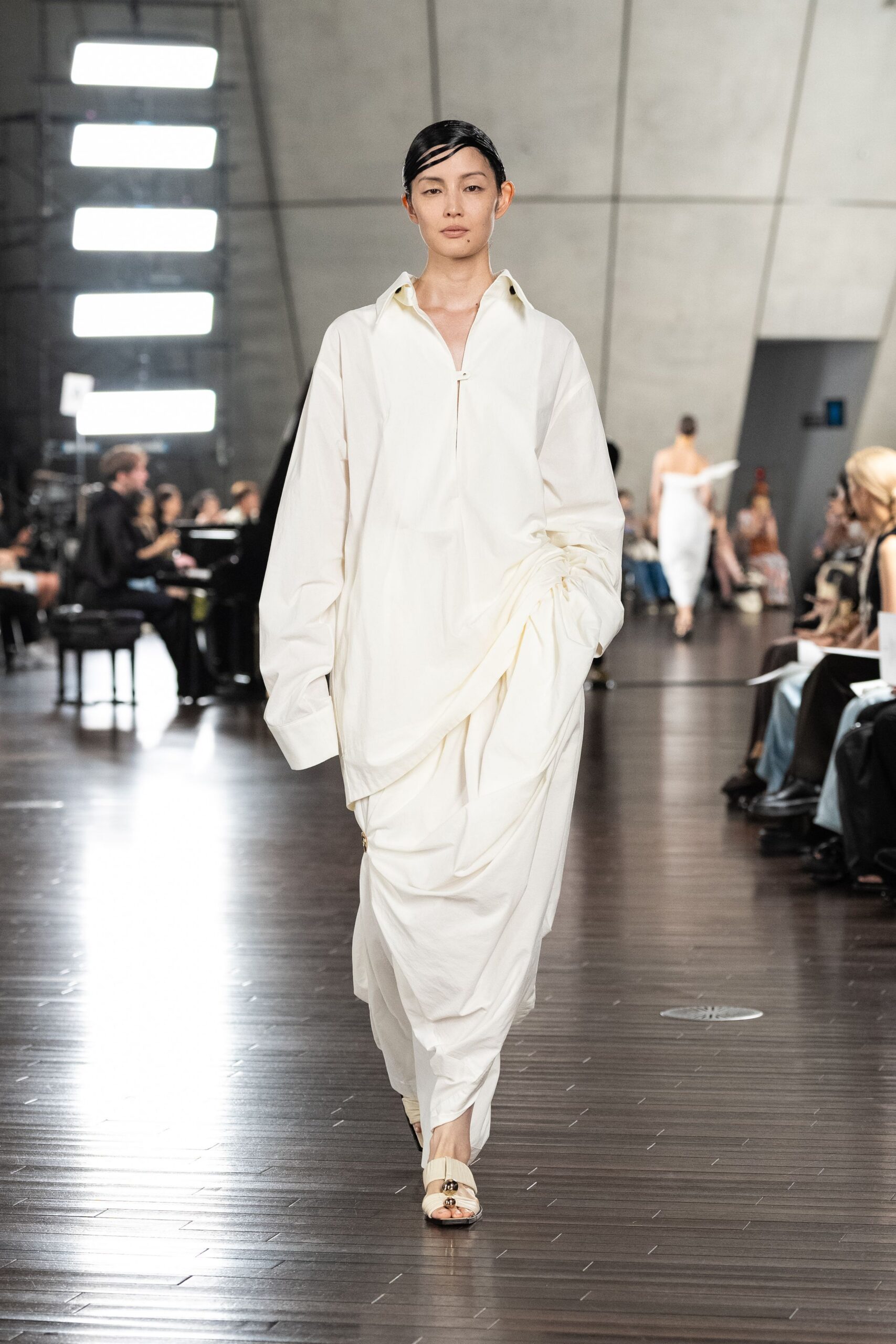 white relaxed shirt-dress with beige shoes