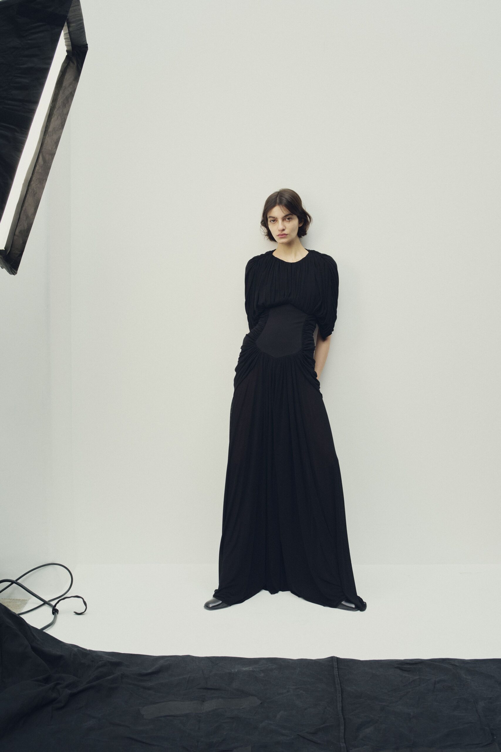 black fitted long-sleeve gown
