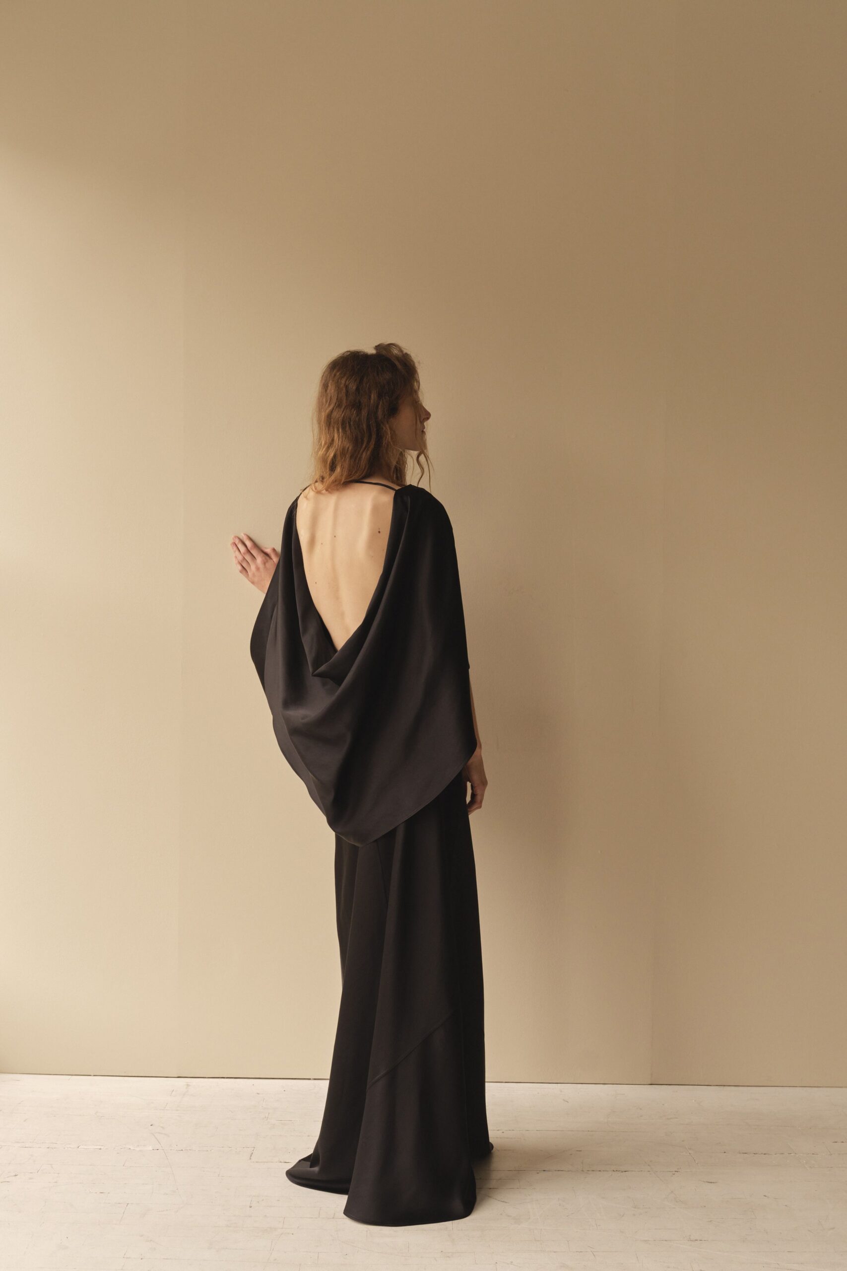 black silk relaxed top and fitted pants