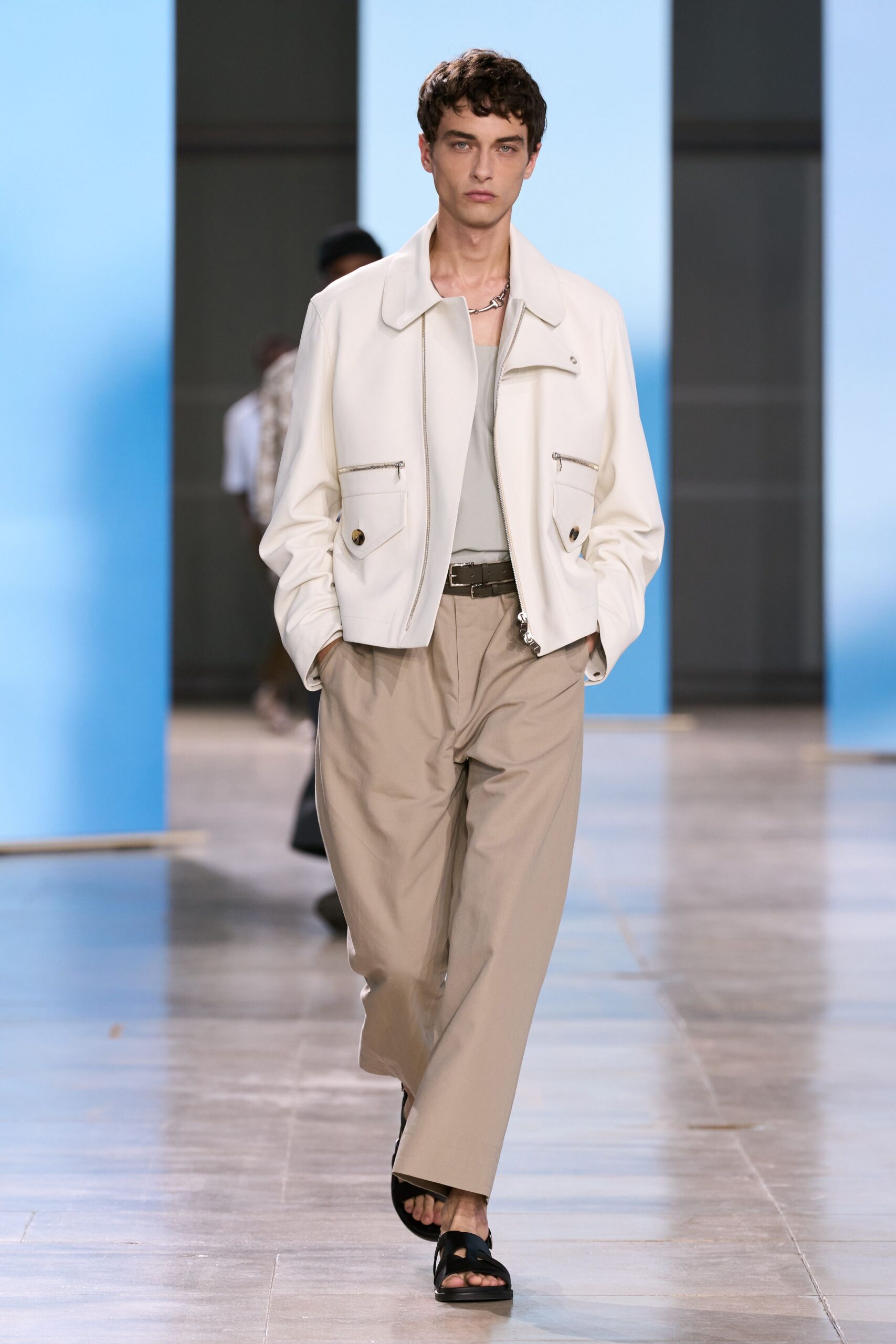 white leather jacket with gray top