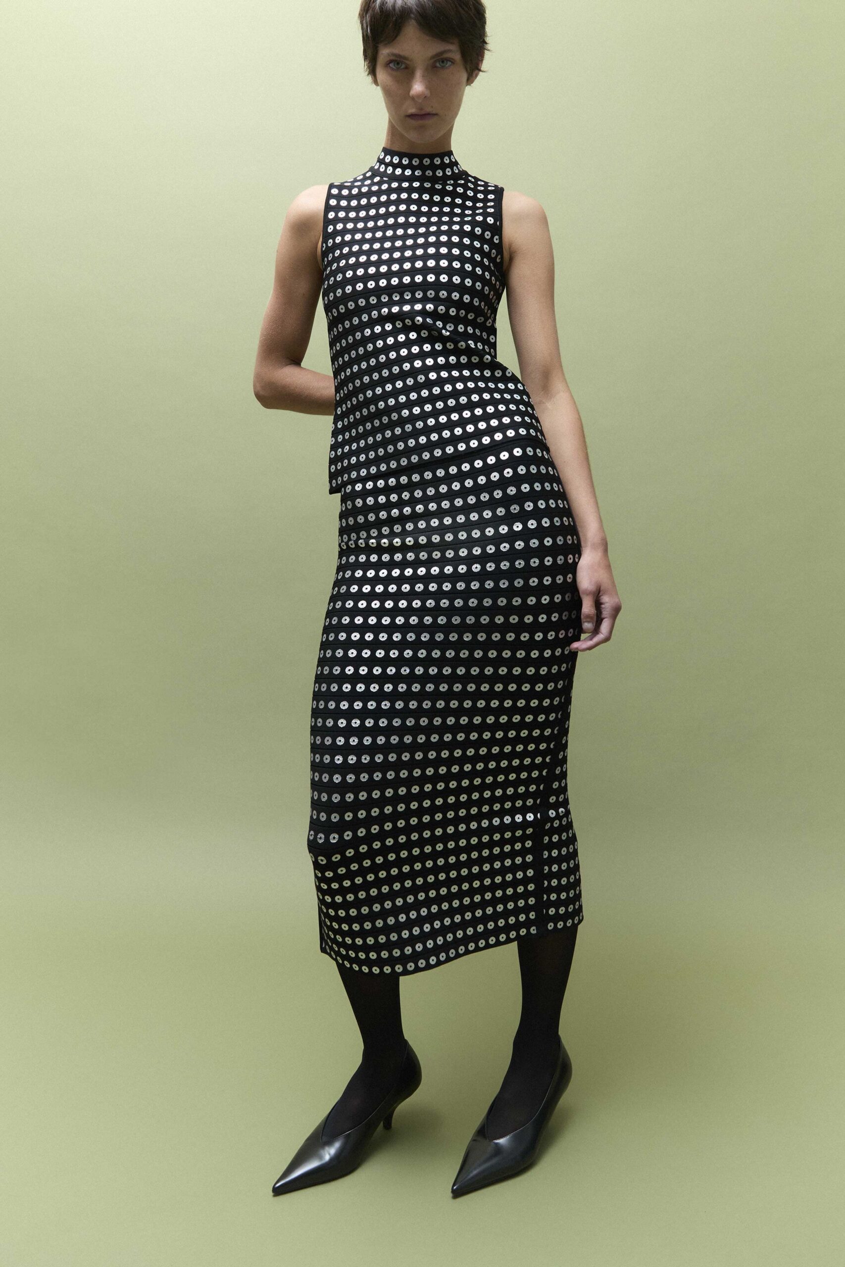 black silk sleeveless high-neck fitted printed top