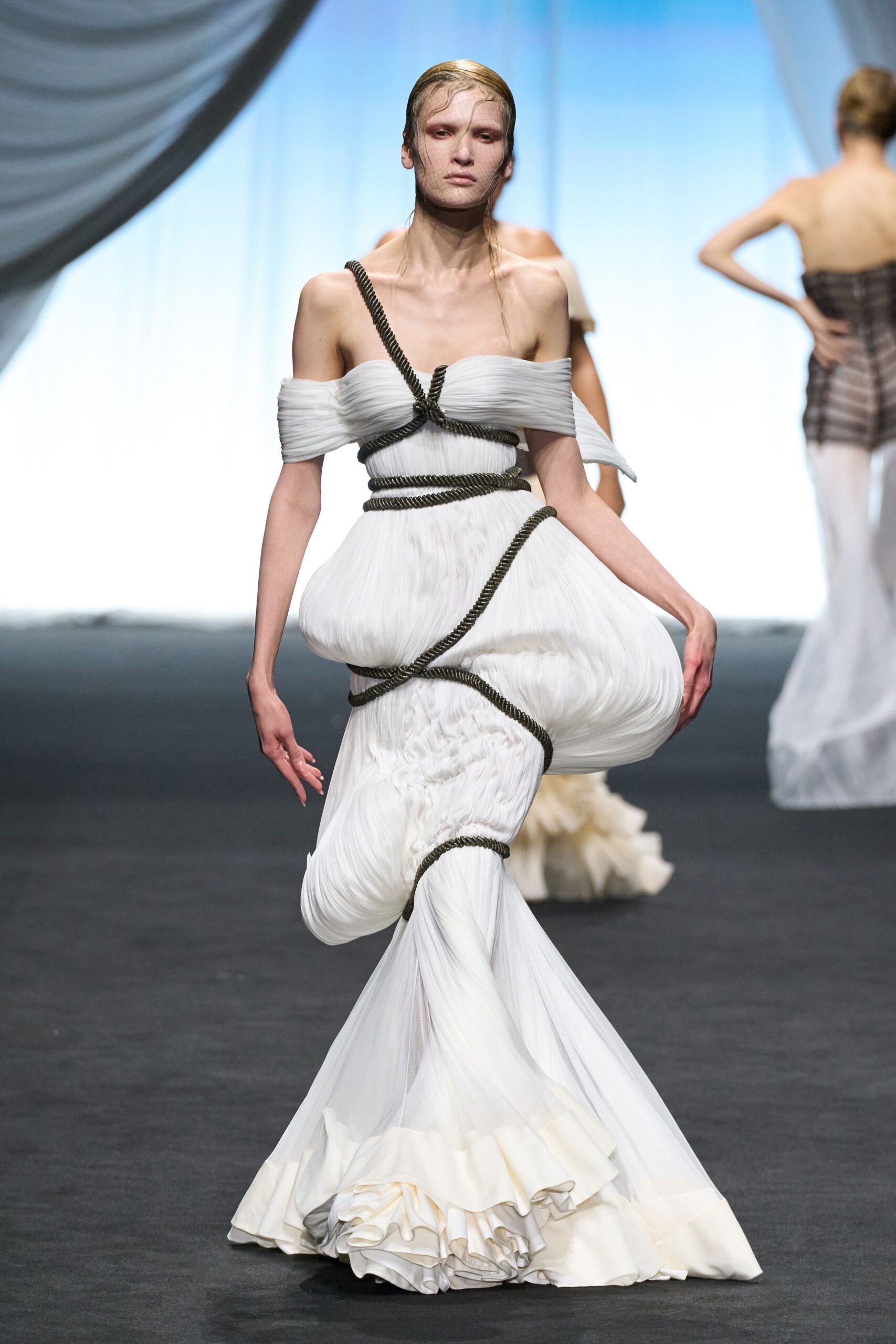 white off-shoulder draped gown