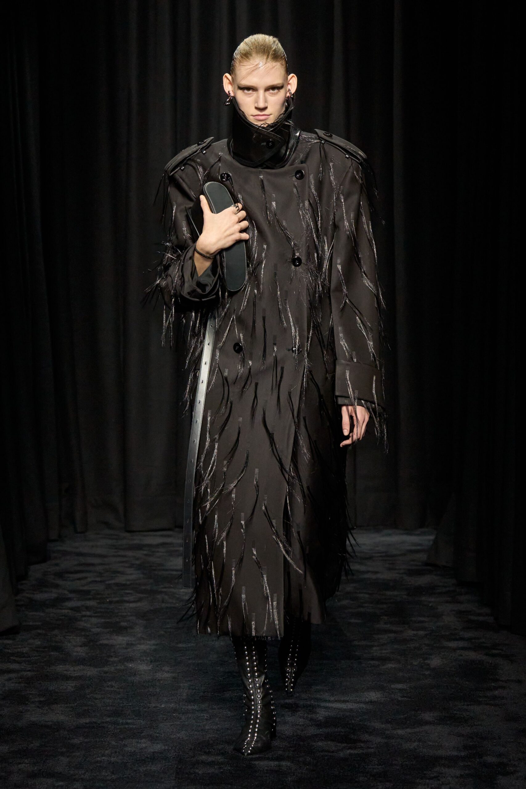 black fringed coat with clutch