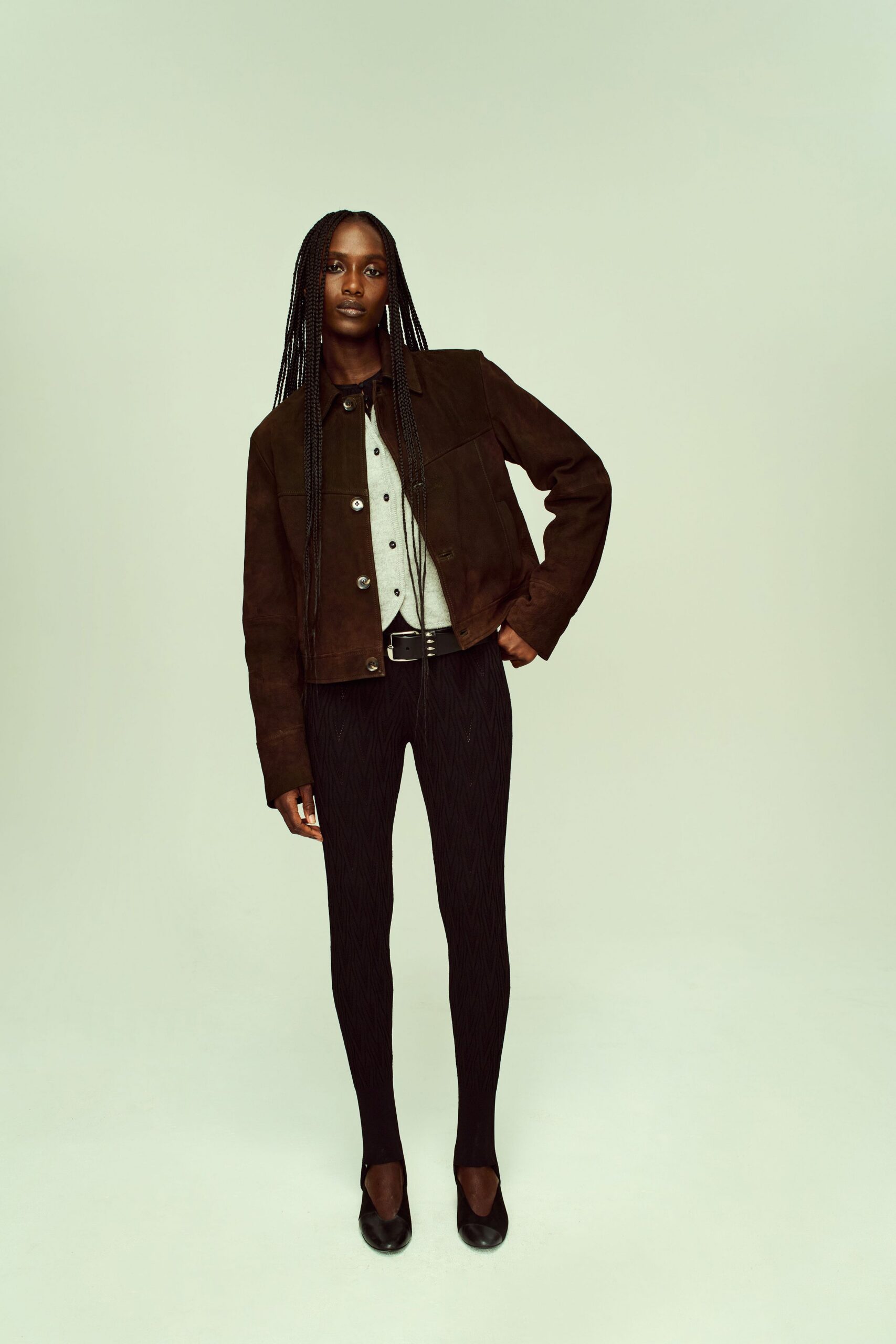 brown suede jacket with gray shirt