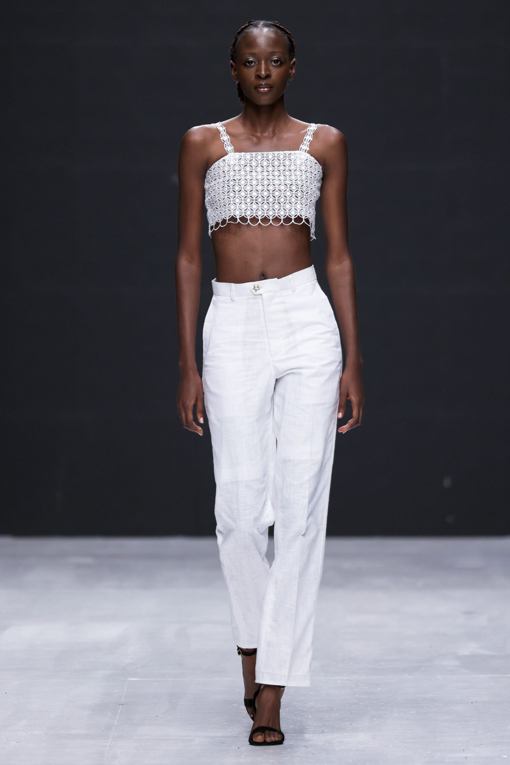 white embroidered cropped top with relaxed pants