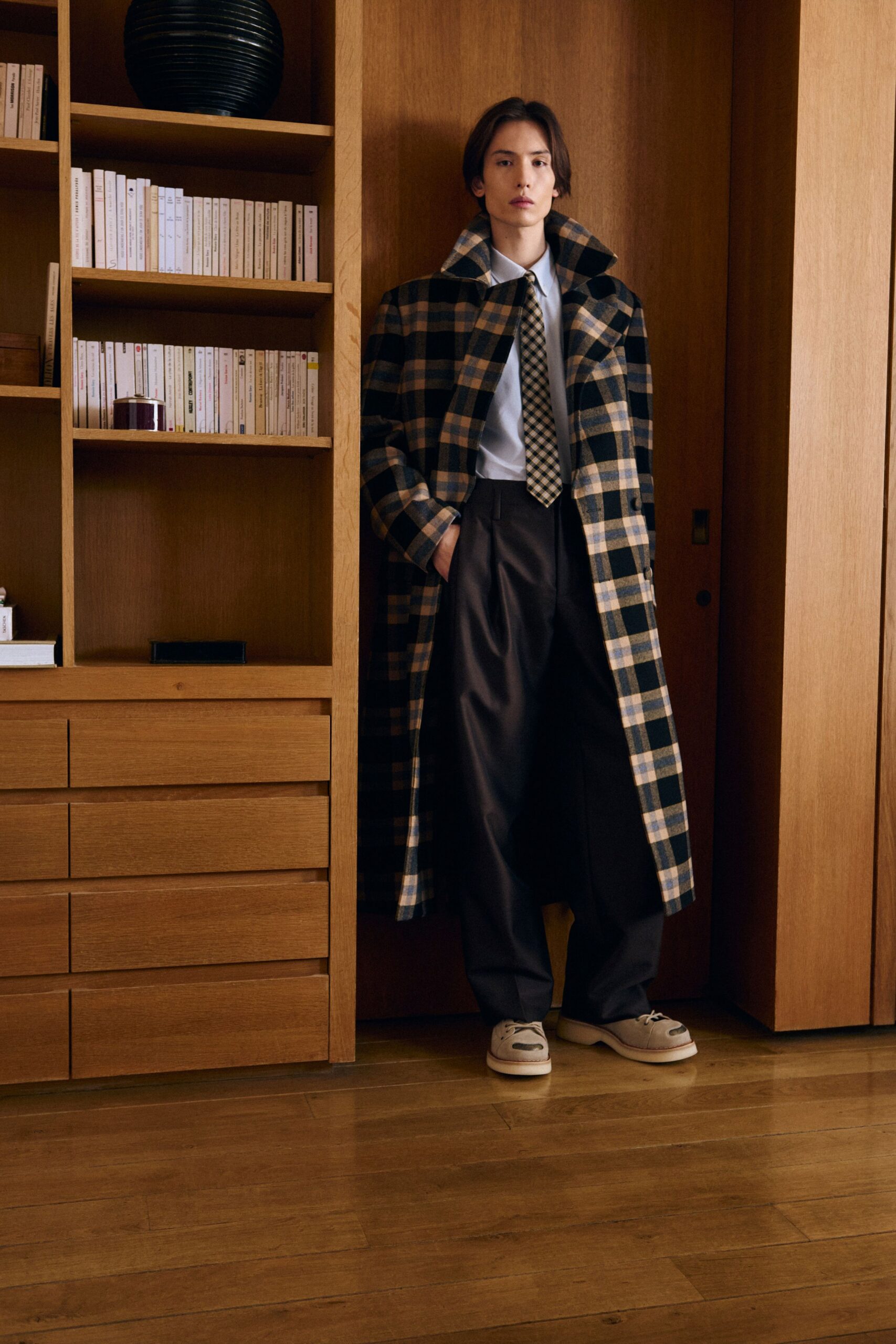 checked wool coat with relaxed pants