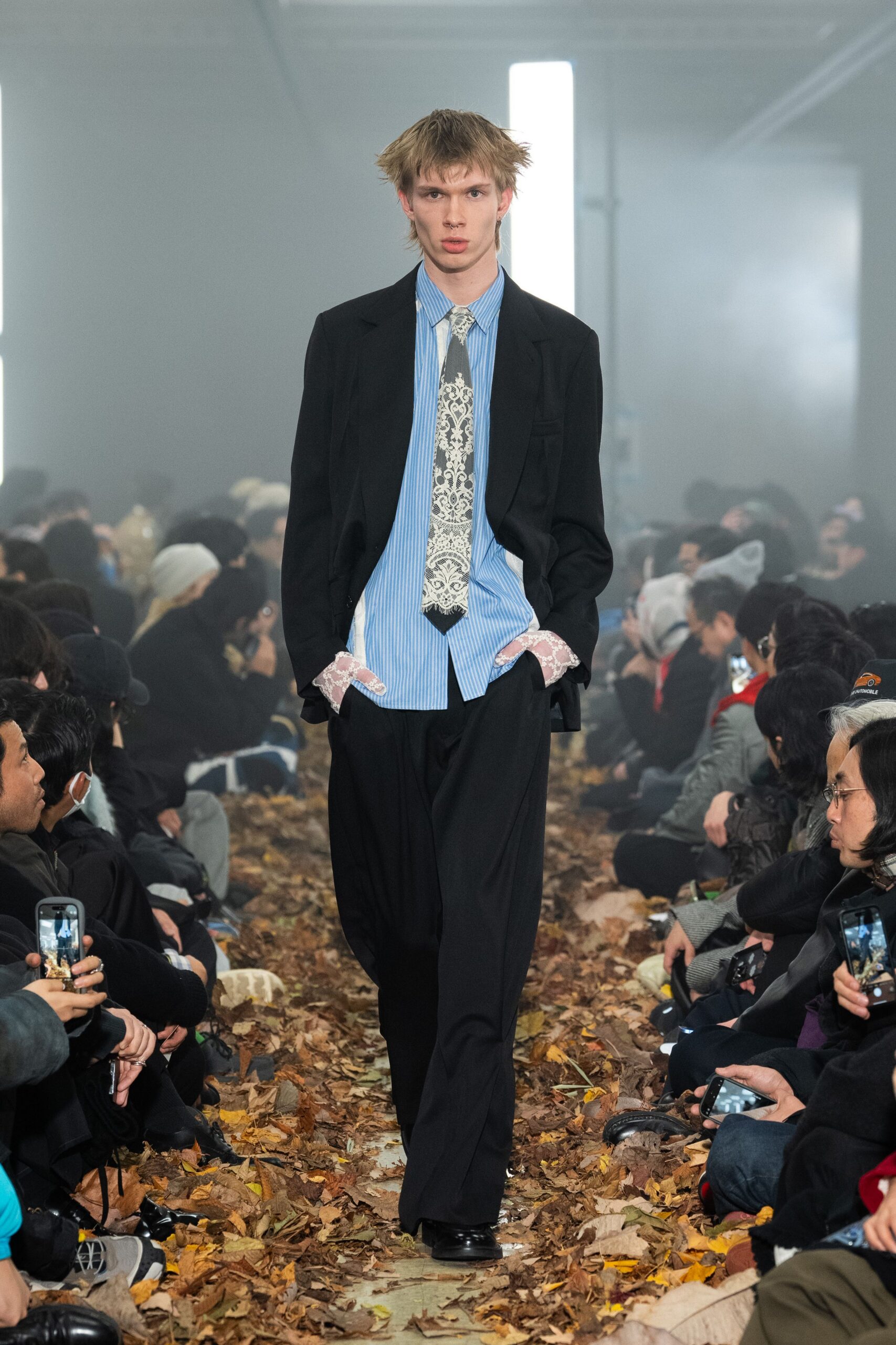 black tailored suit with striped shirt