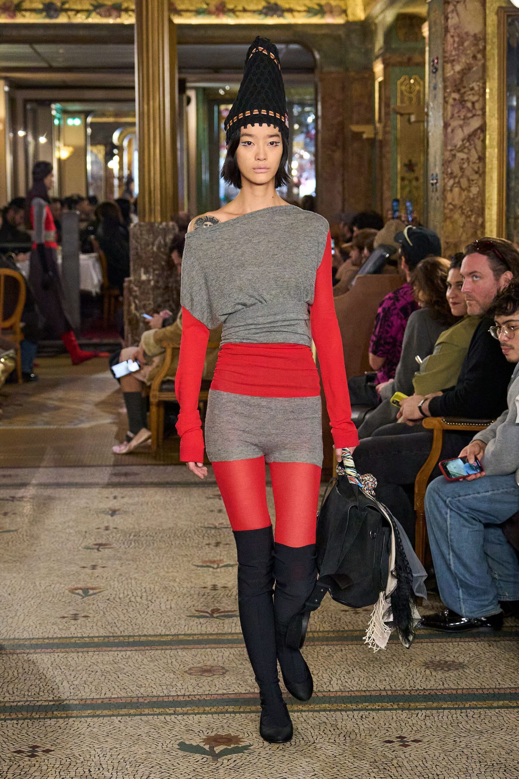 gray off-shoulder top with red skirt