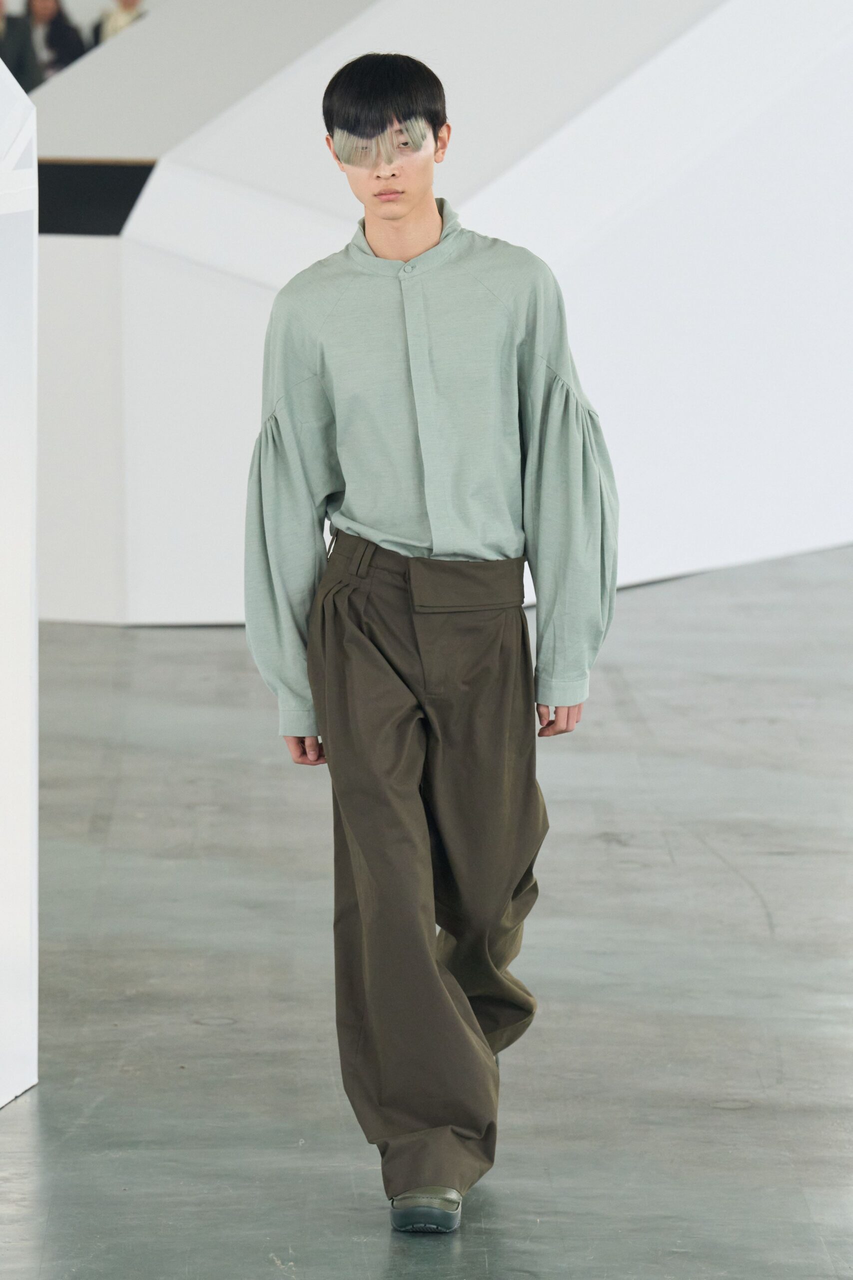 green relaxed shirt with brown pants