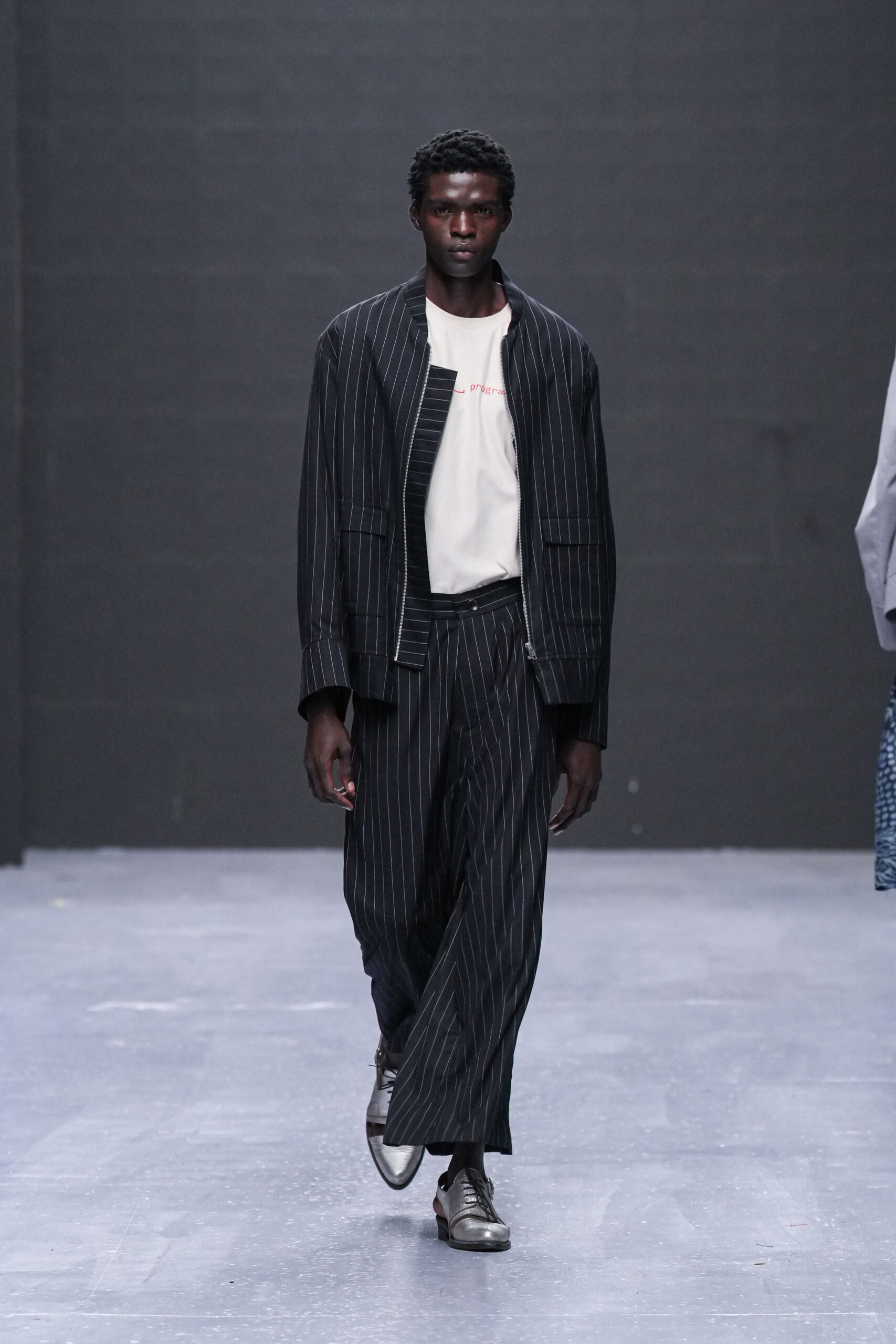 black and white striped suit