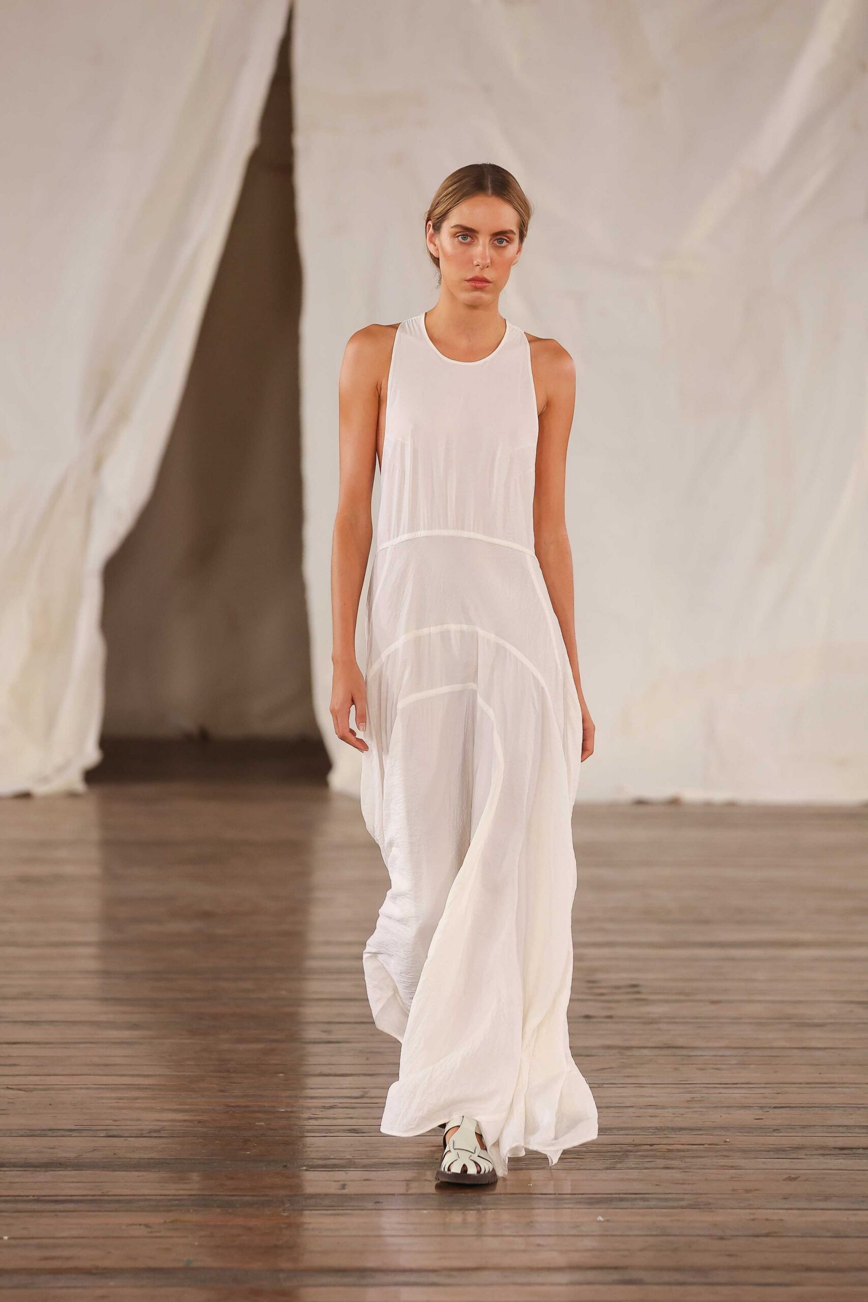 white flowing maxi dress with black shoes