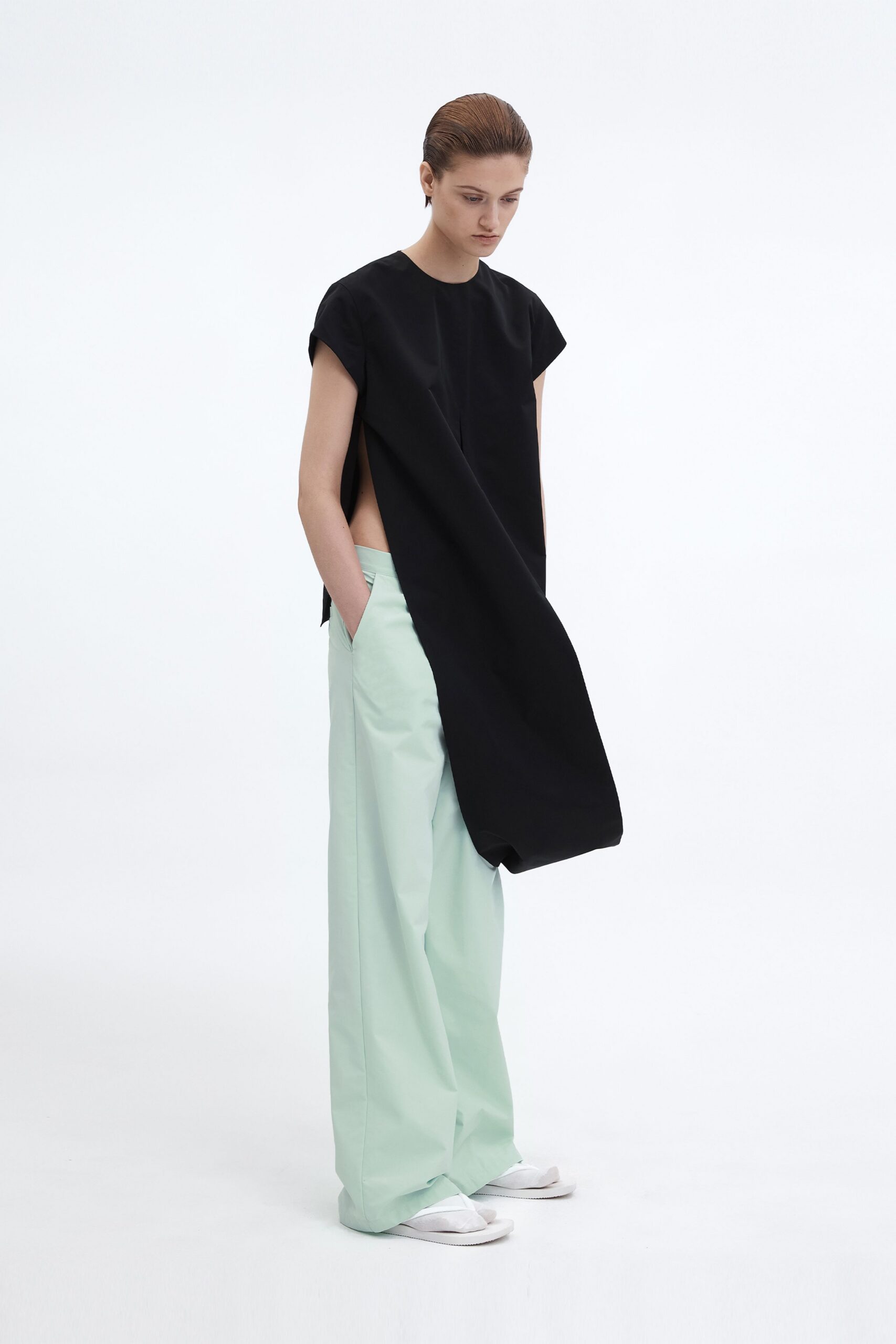 black relaxed top with mint pants