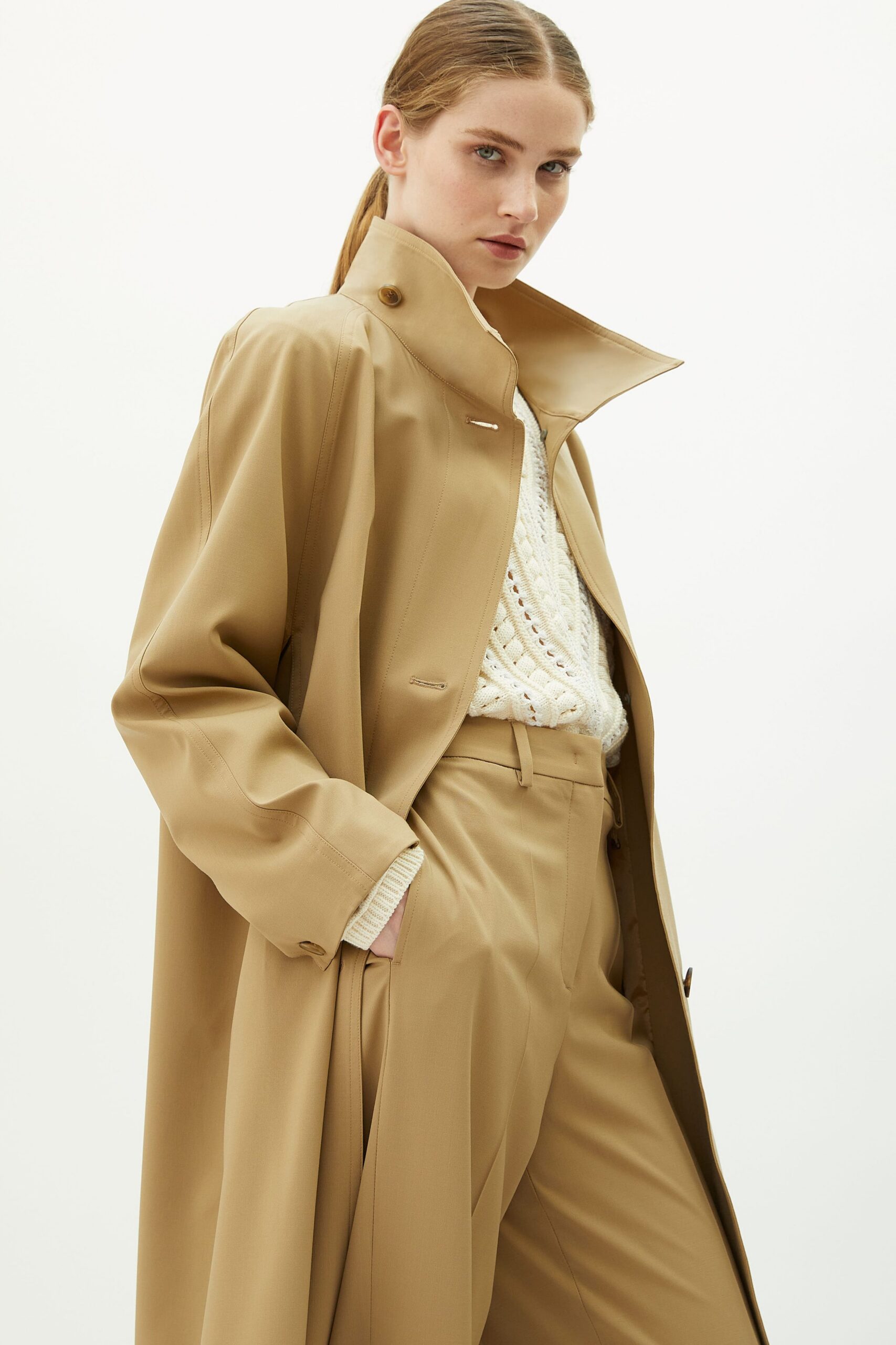 beige vinyl long-sleeve collared relaxed buttoned coat