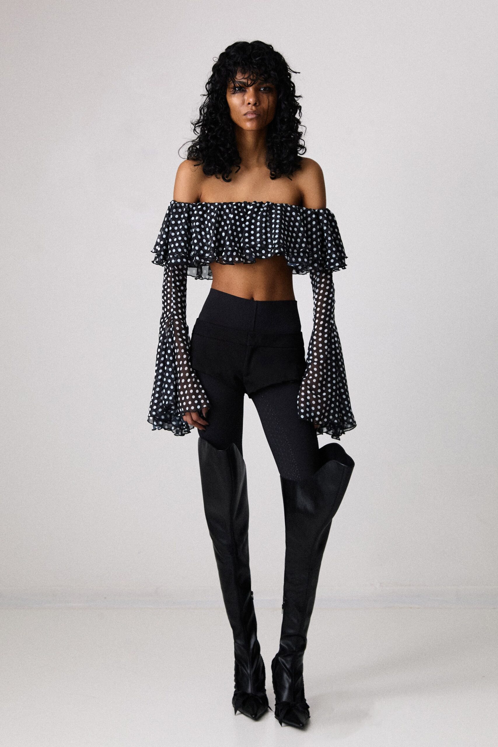 black cotton off-shoulder long-sleeve fitted ruffled polka-dot top