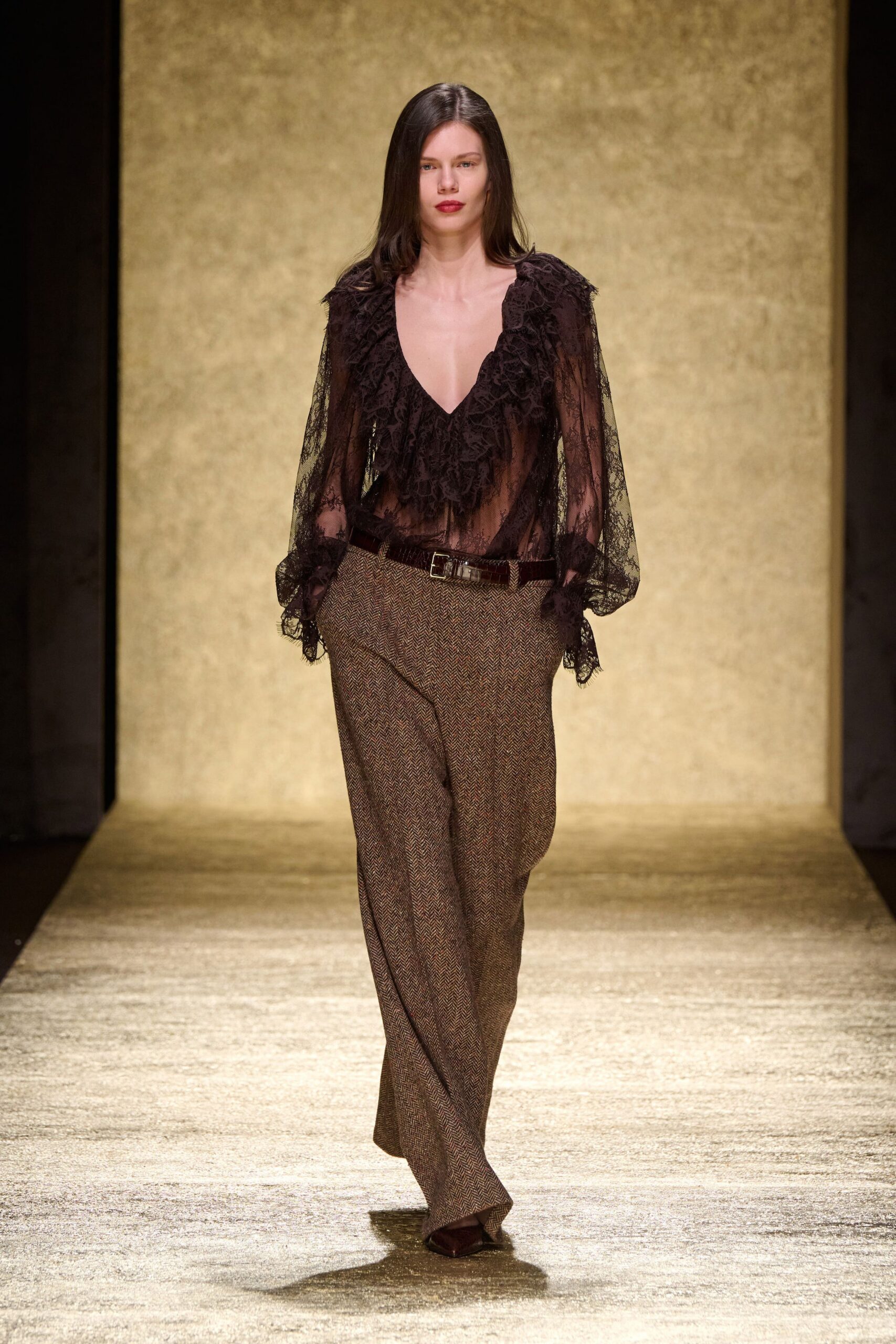 black lace ruffled blouse with brown pants