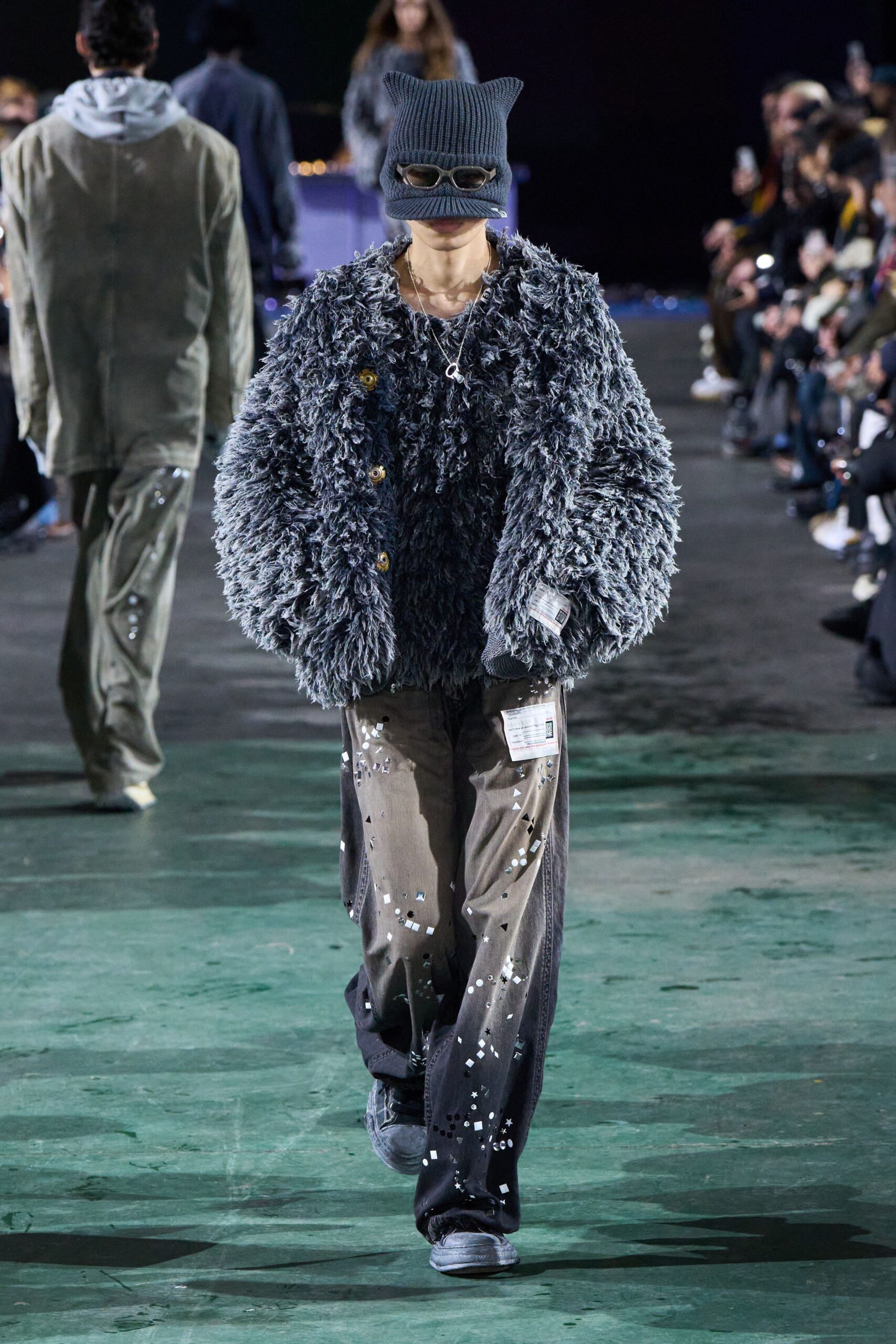 gray faux-fur jacket with relaxed pants