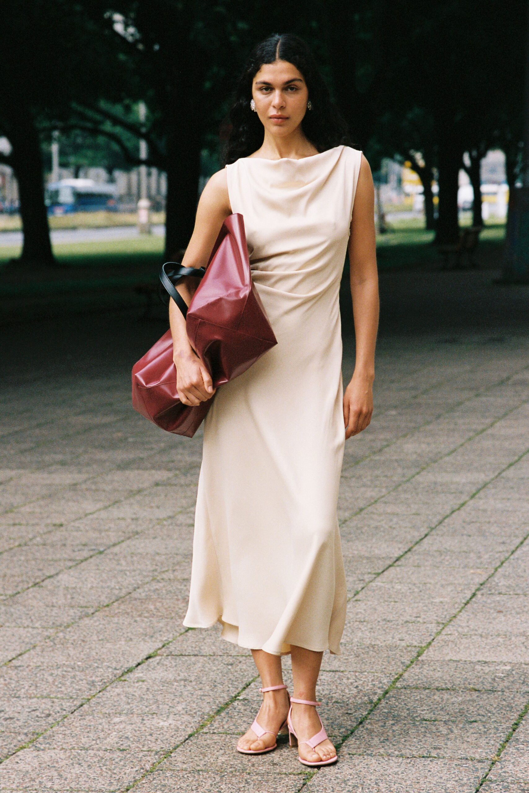 beige silk sleeveless high-neck fitted draped midi dress
