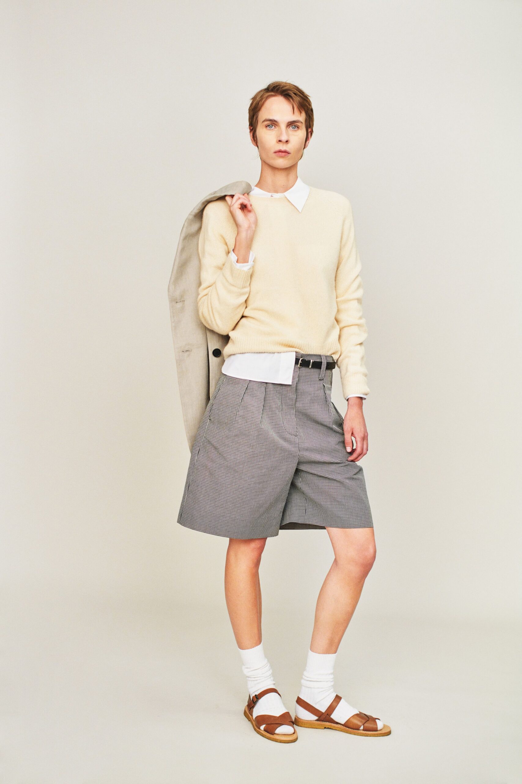 beige wool sweater with gray shorts
