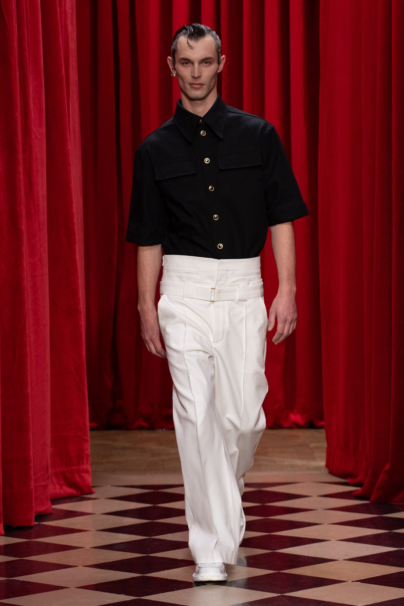 black shirt white tailored pants