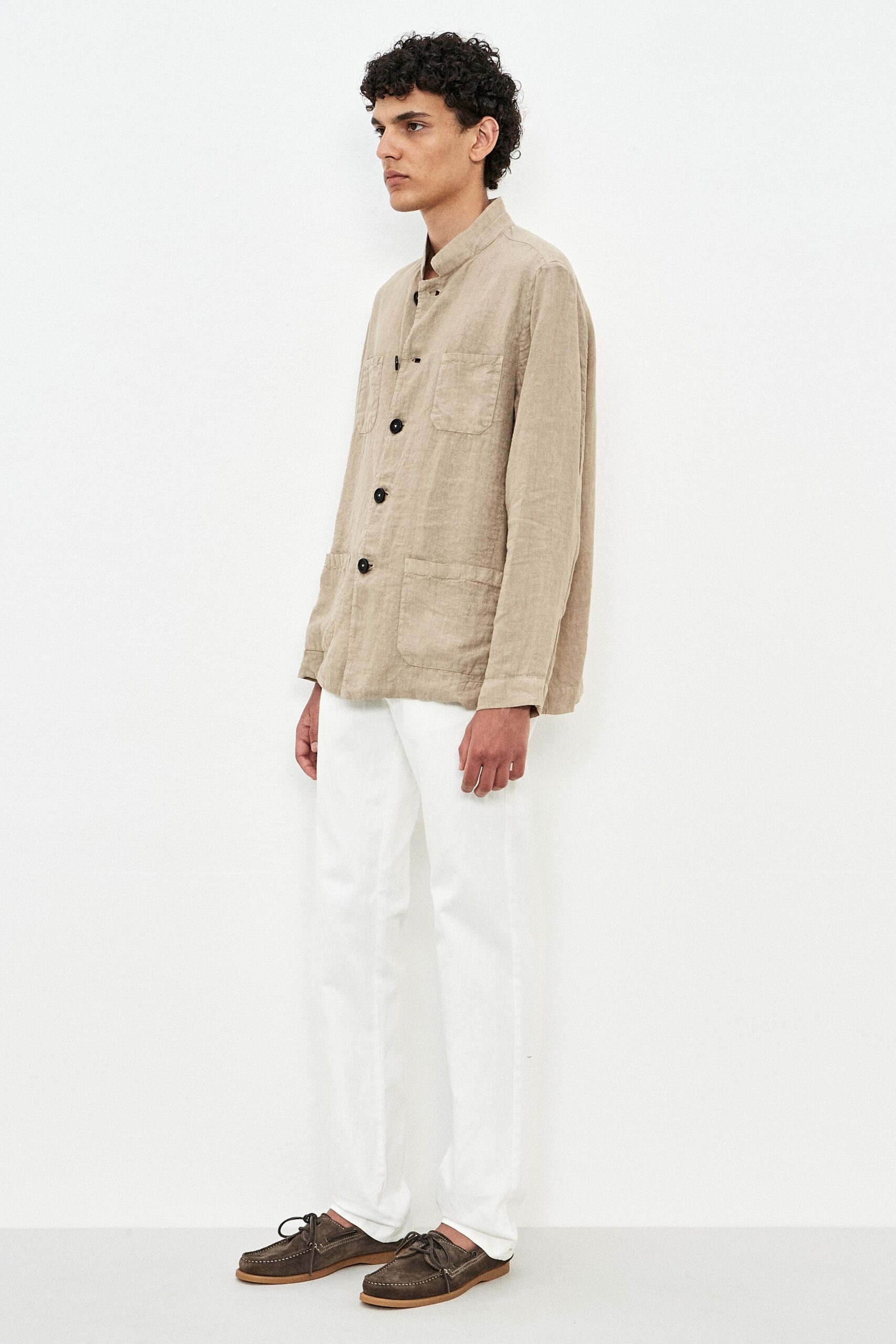 beige linen shirt with white pants