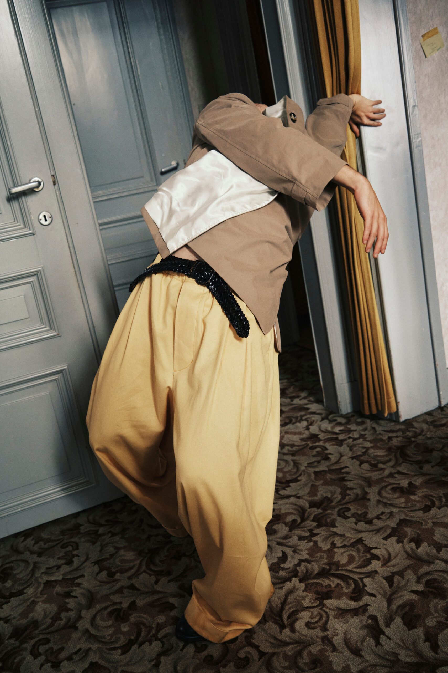 beige jacket yellow pants