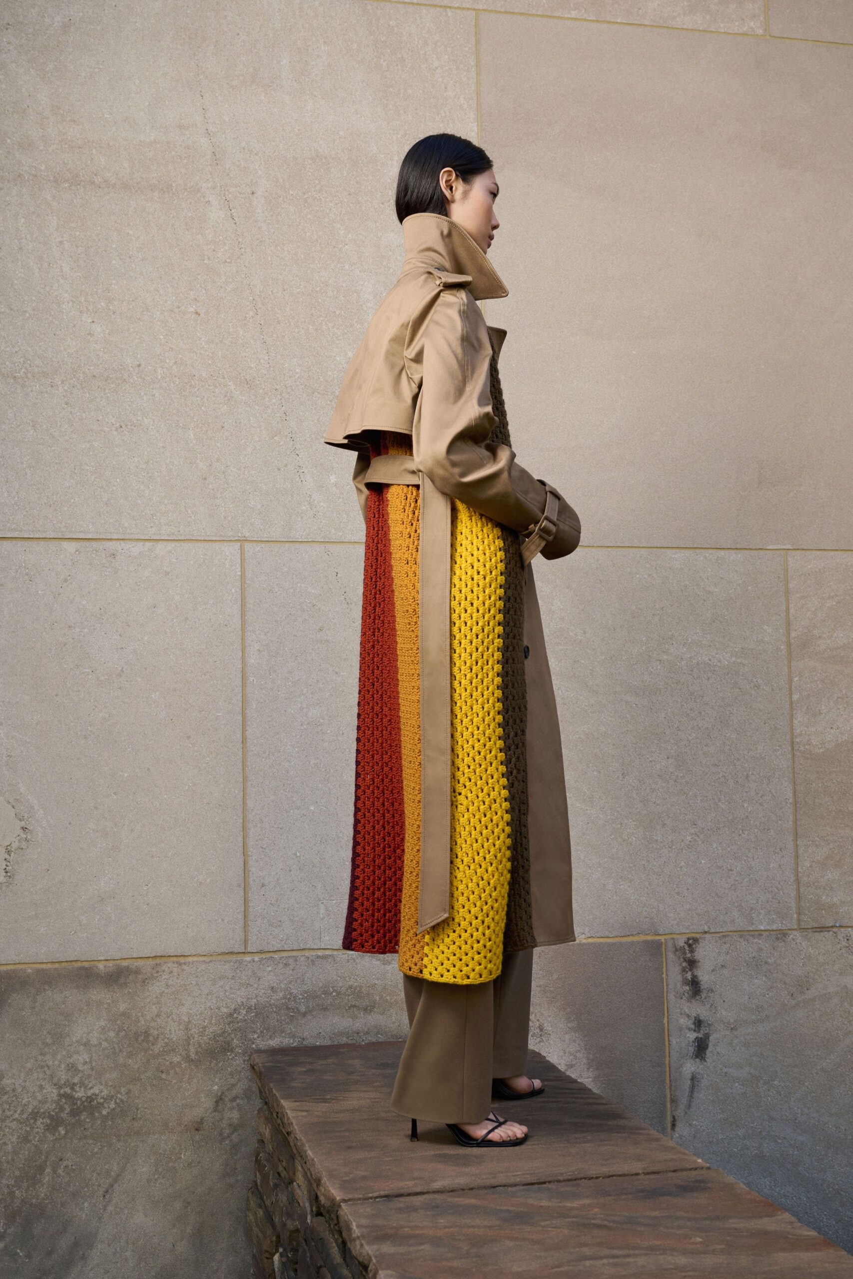 beige trench coat with brown pants