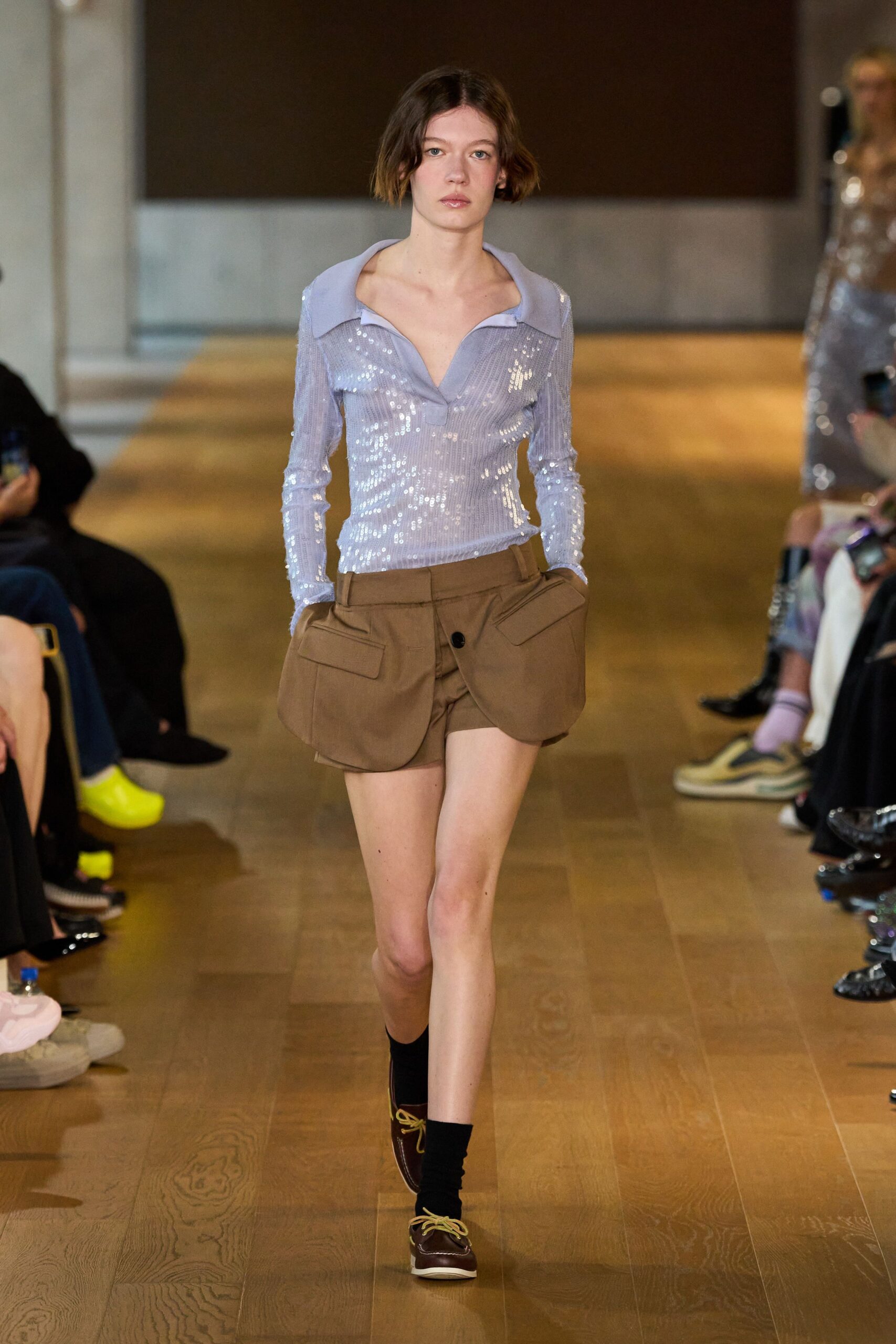 blue sequin top with brown shorts